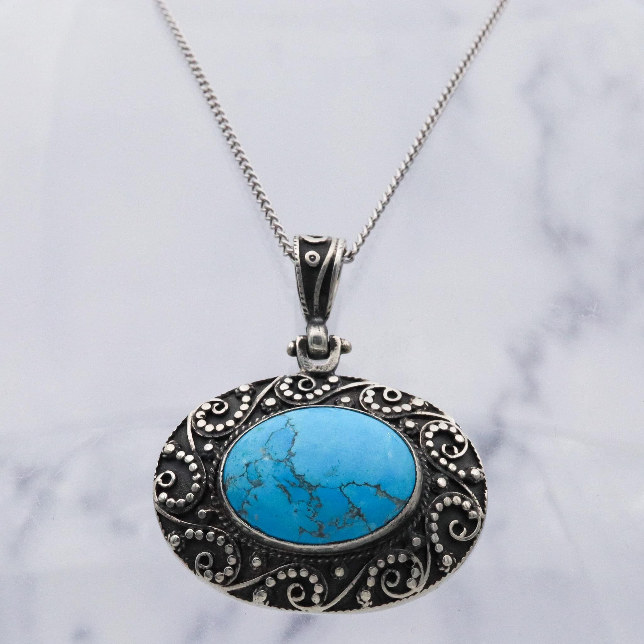 Vintage sterling silver turquoise and applied bead work pendant