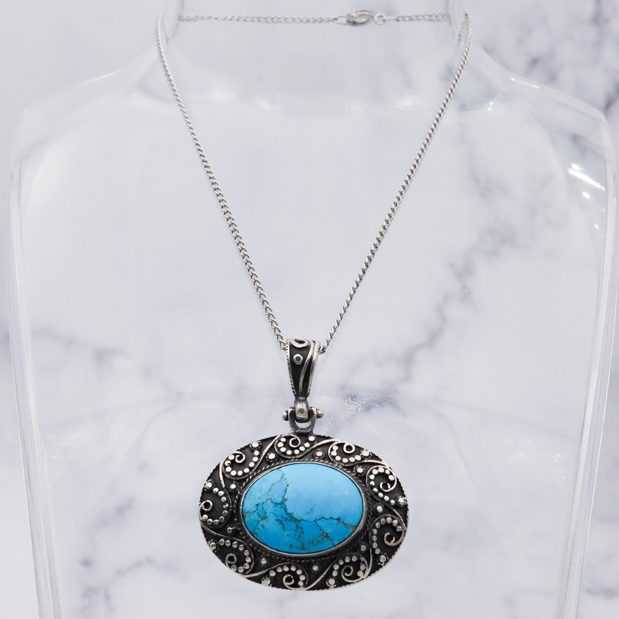 Vintage sterling silver turquoise and applied bead work pendant