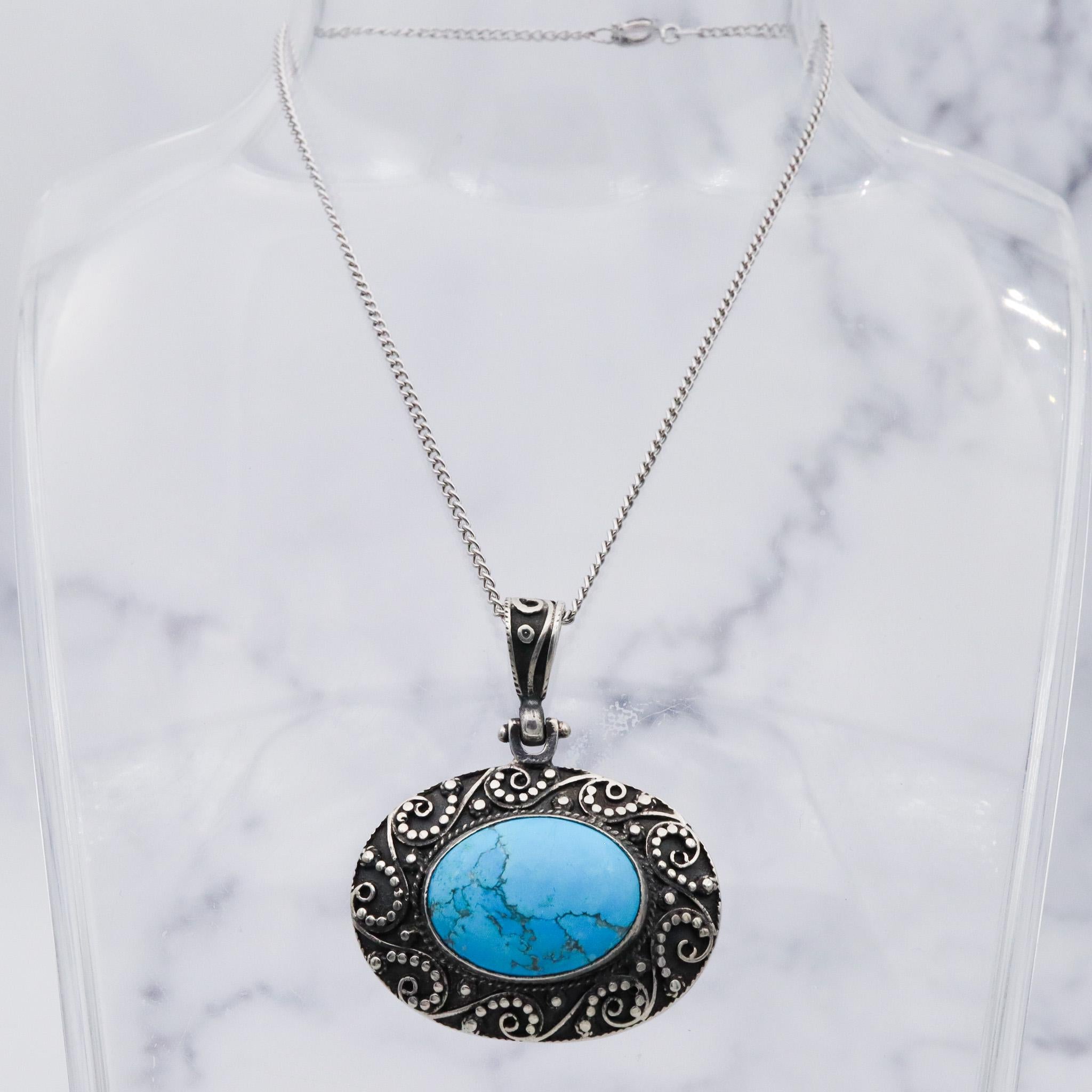 Vintage sterling silver turquoise and applied bead work pendant