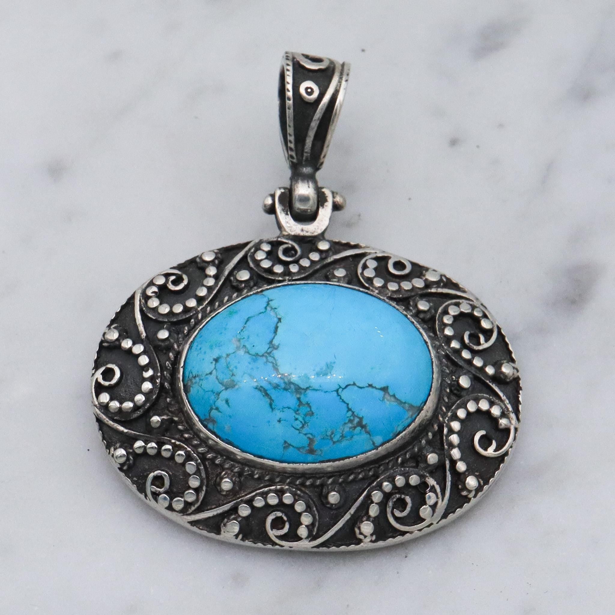 Vintage sterling silver turquoise and applied bead work pendant