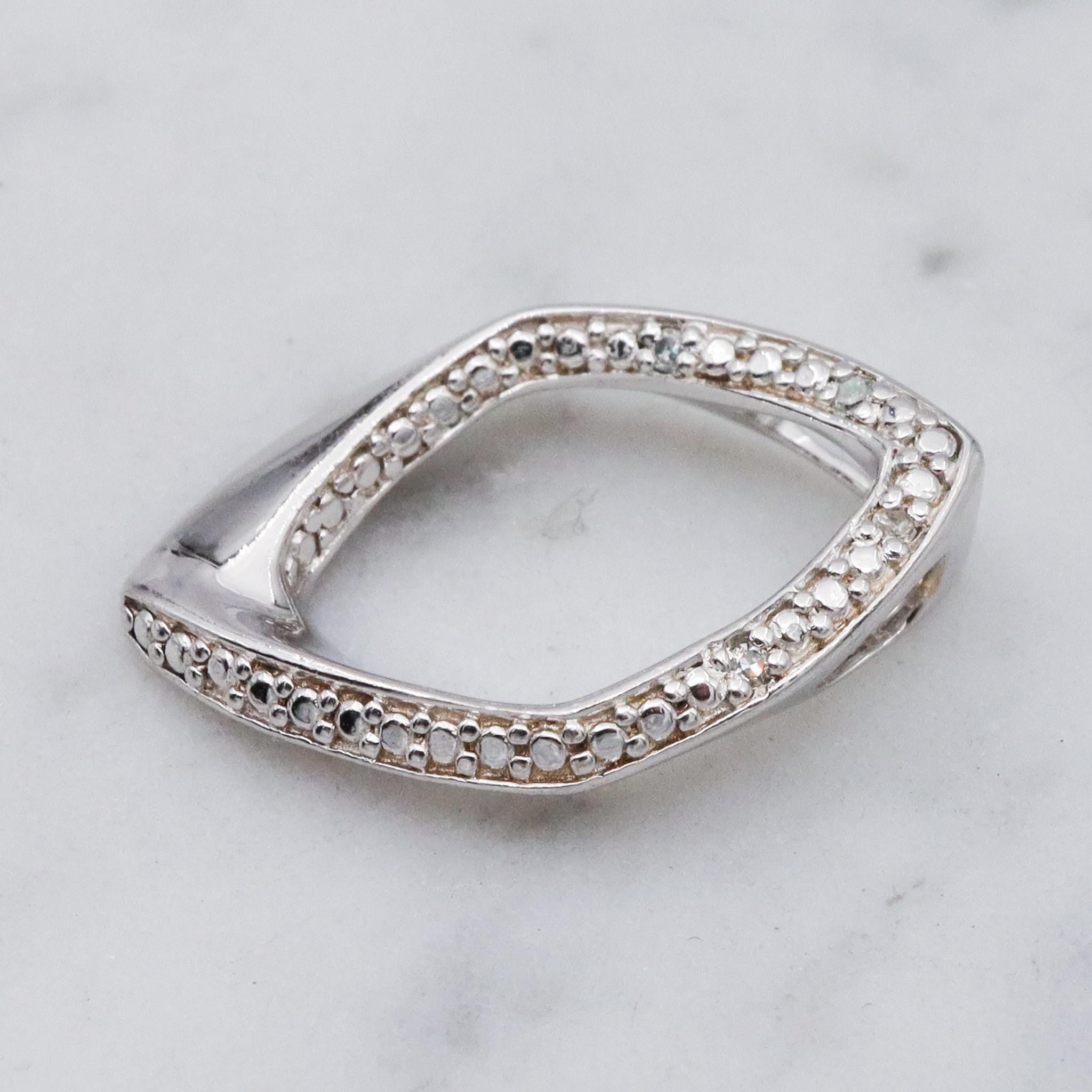 Vintage sterling silver and diamond abstract pendant