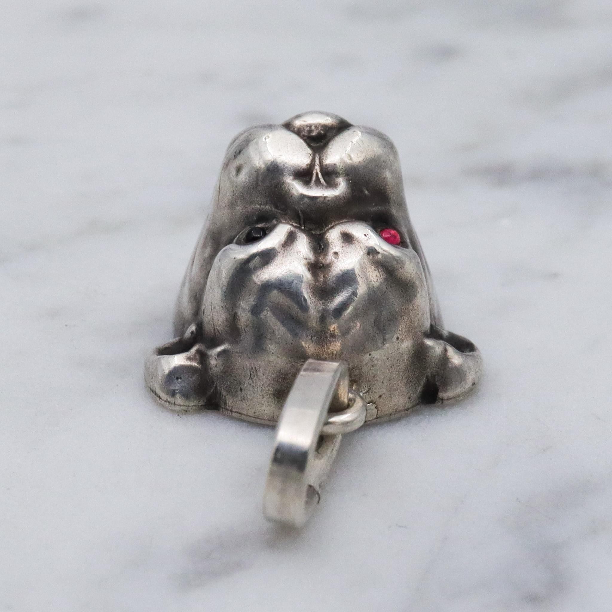 Antique Unger Brothers sterling silver bulldog with ruby glass eyes pendant