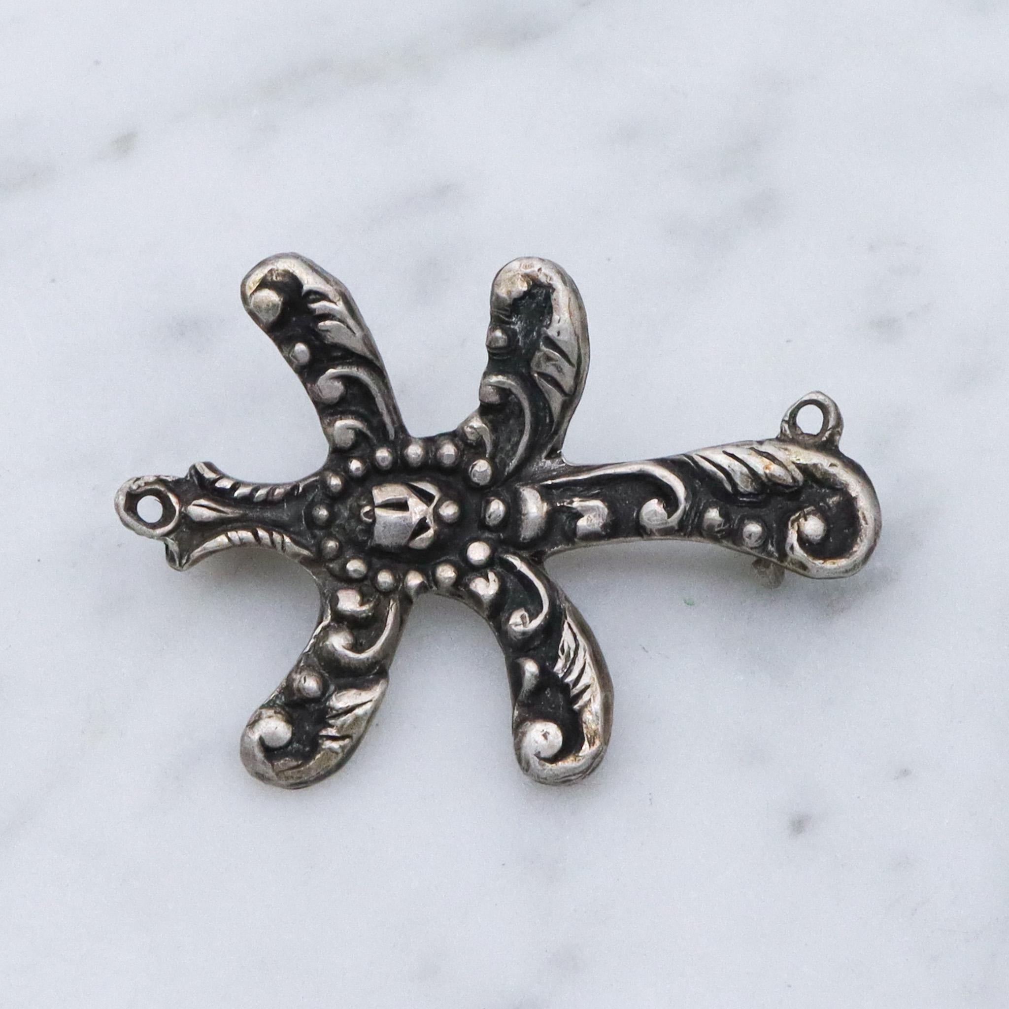 Antique renaissance revival sterling silver brooch