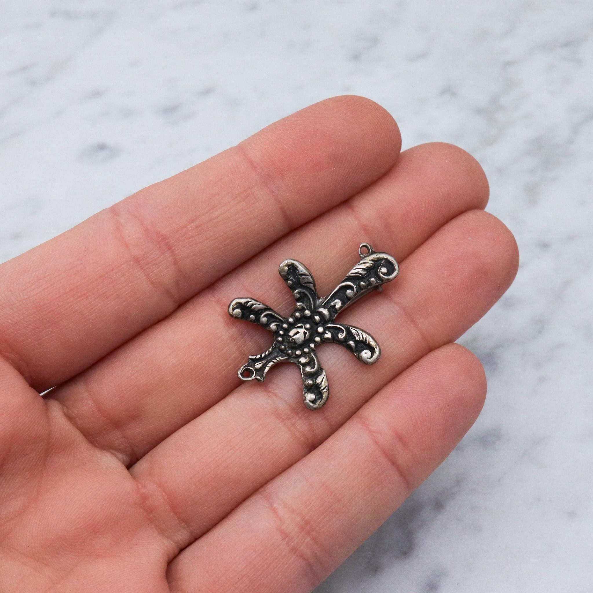 Antique renaissance revival sterling silver brooch