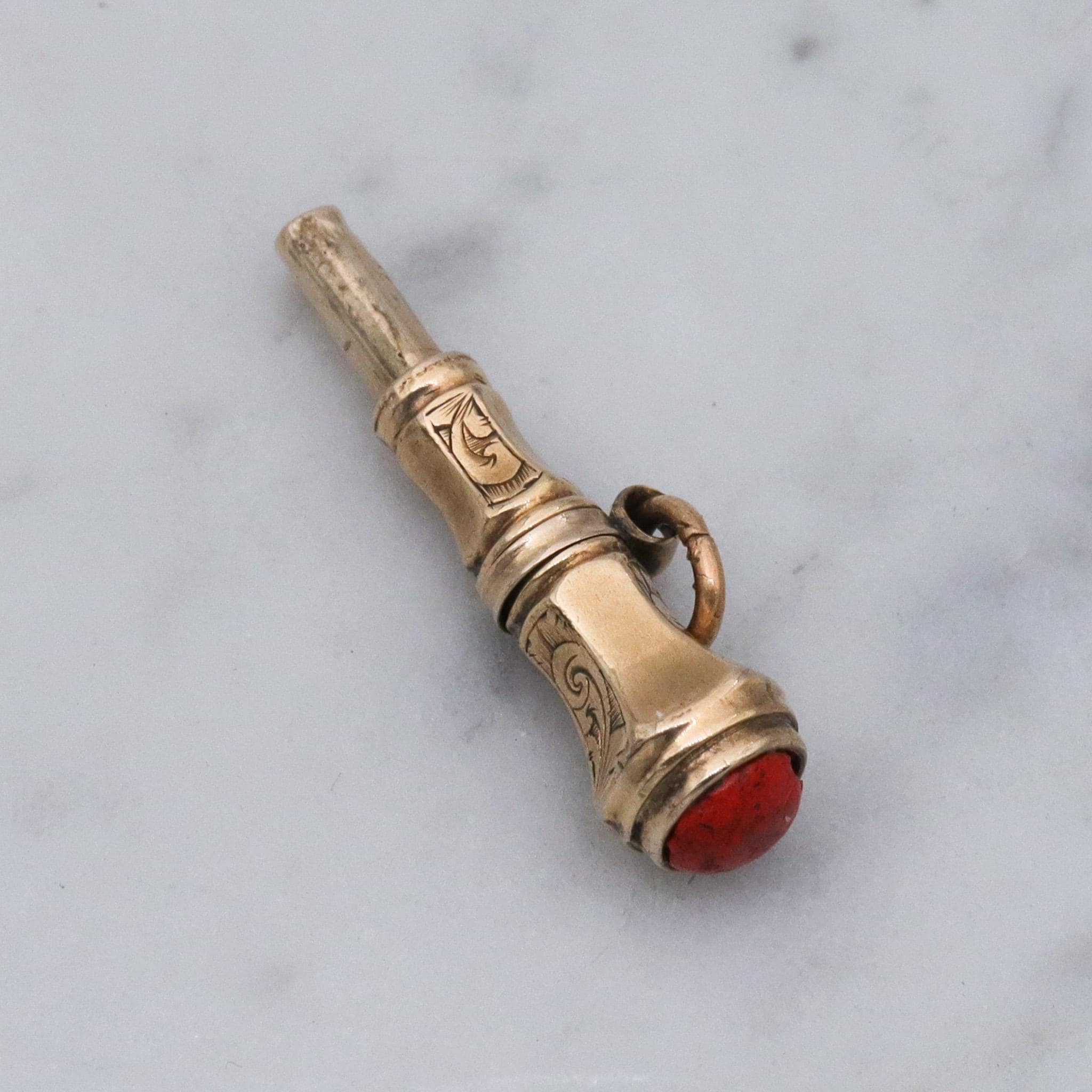 Antique Victorian 10k gold watch key fob with red stone end