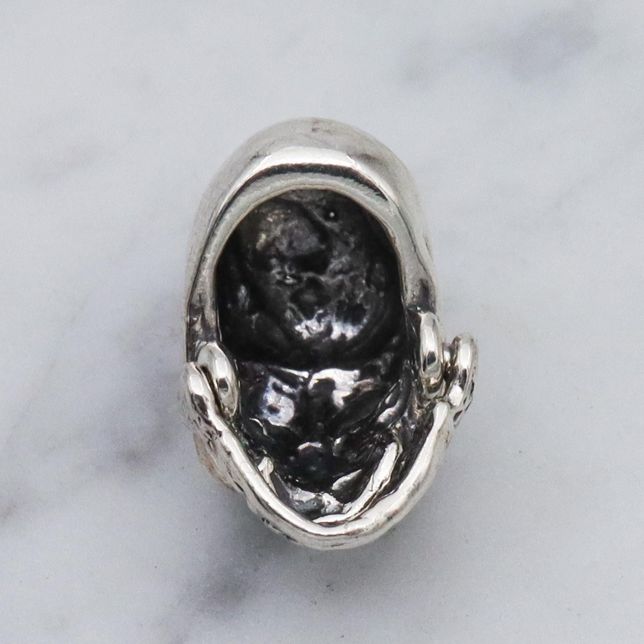 Vintage sterling silver hinged jaw skull pendants
