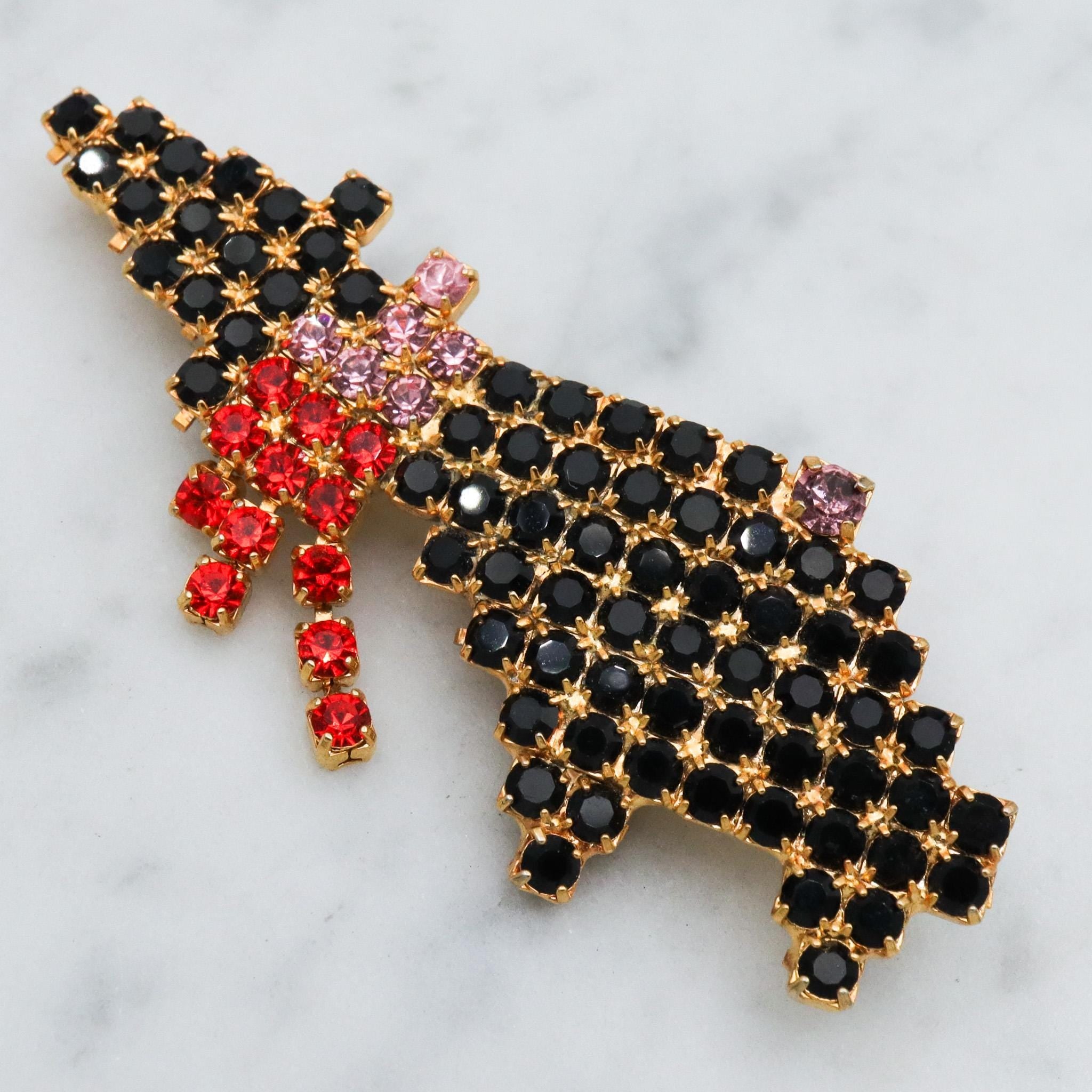 Vintage gold tone rhinestone witch brooch