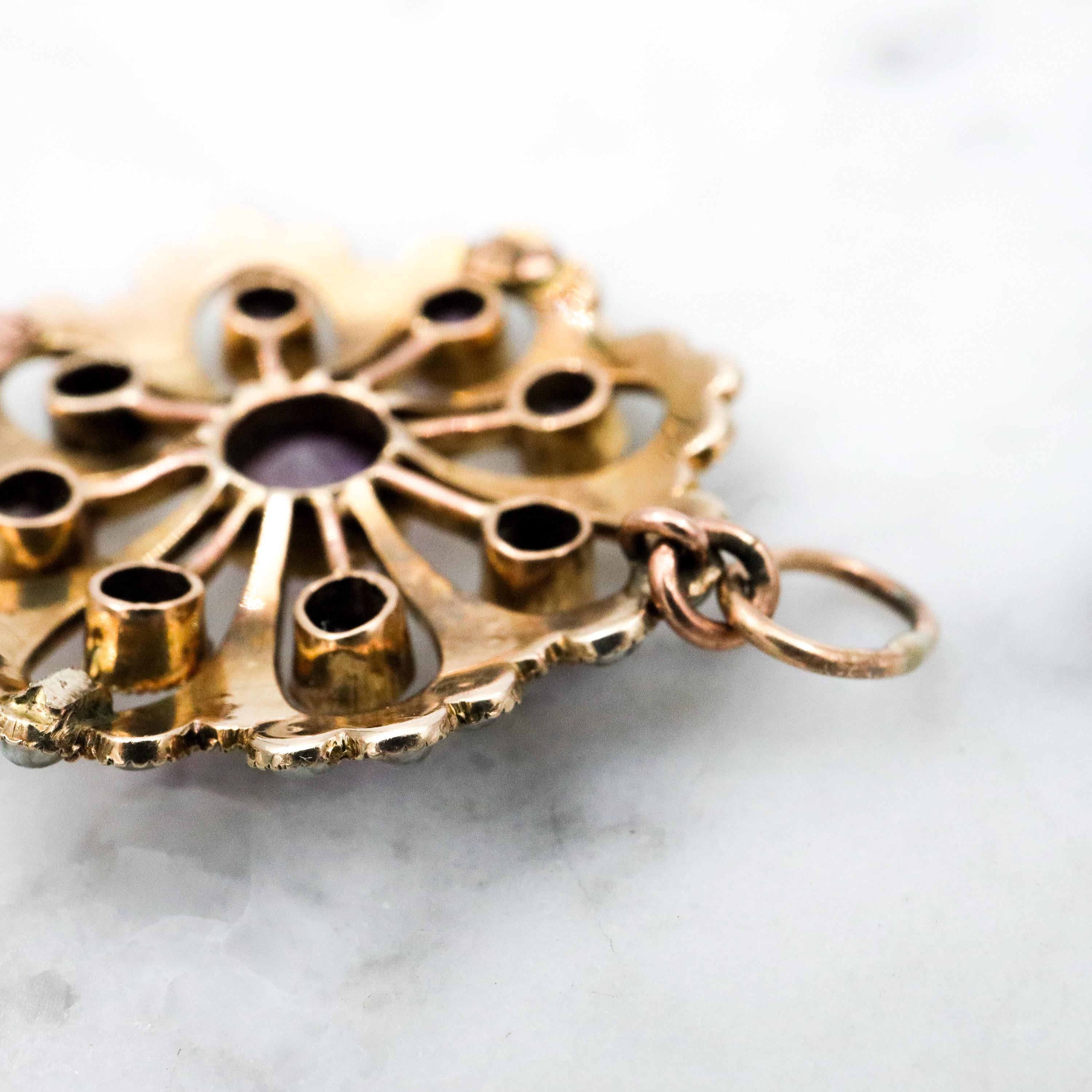 Antique early Victorian 9k gold, amethyst and split pearl flower pendant
