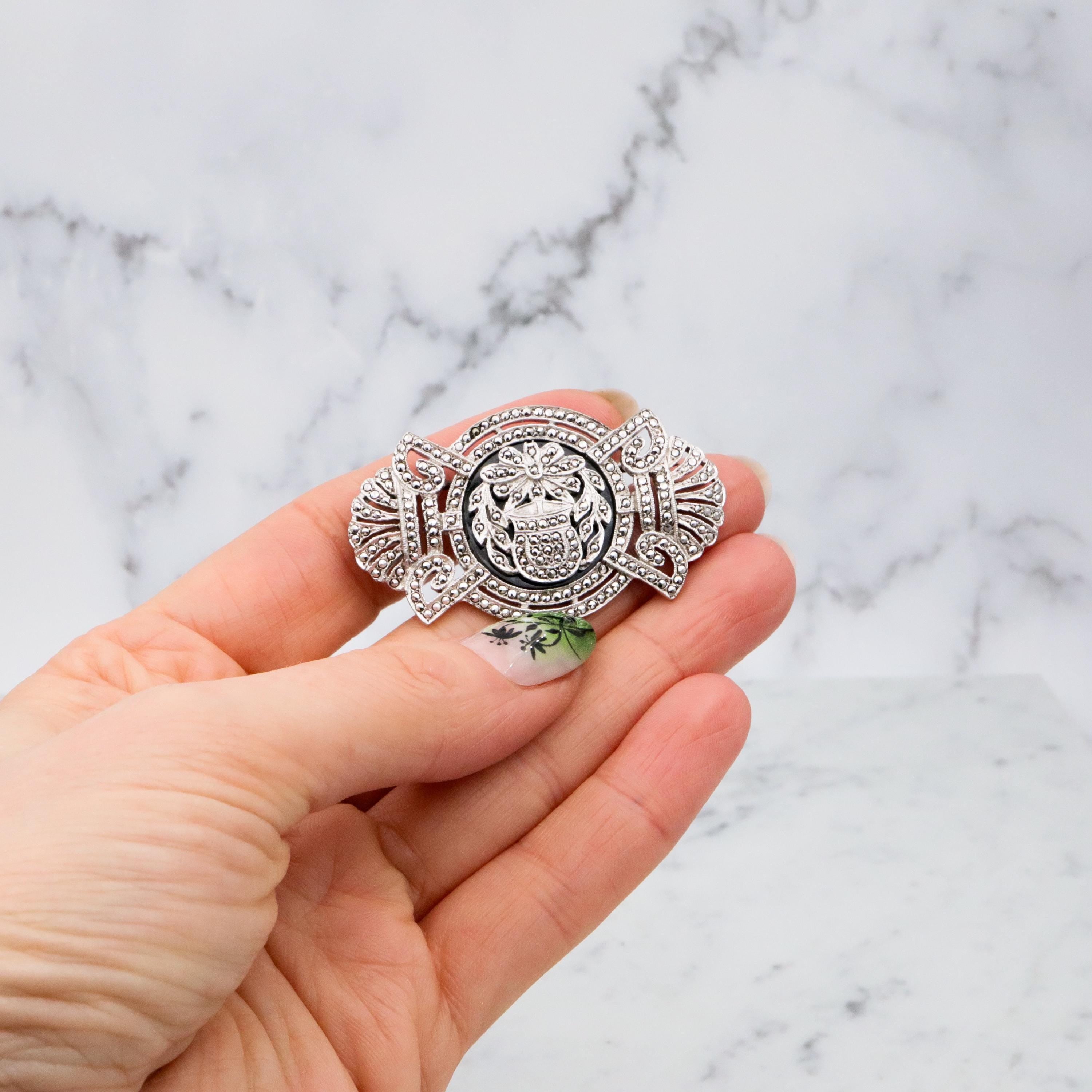 Antique Art Deco sterling marcasite floral framed brooch by EAGLE