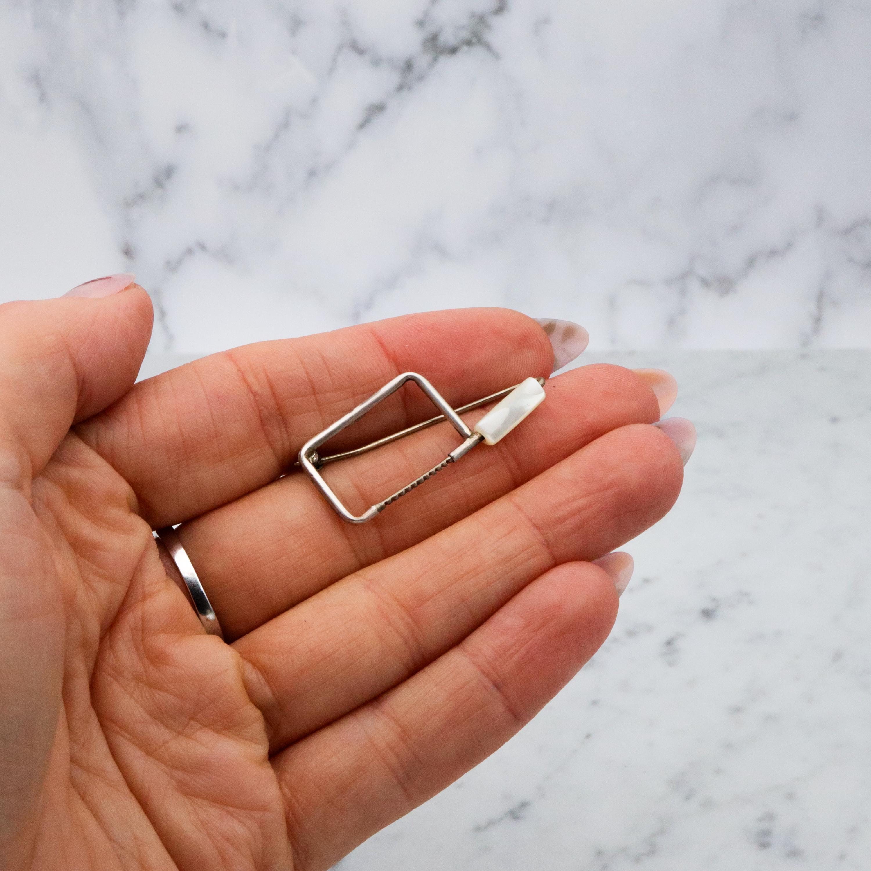 Unique one of a kind sterling & mother of pearl coping saw brooch