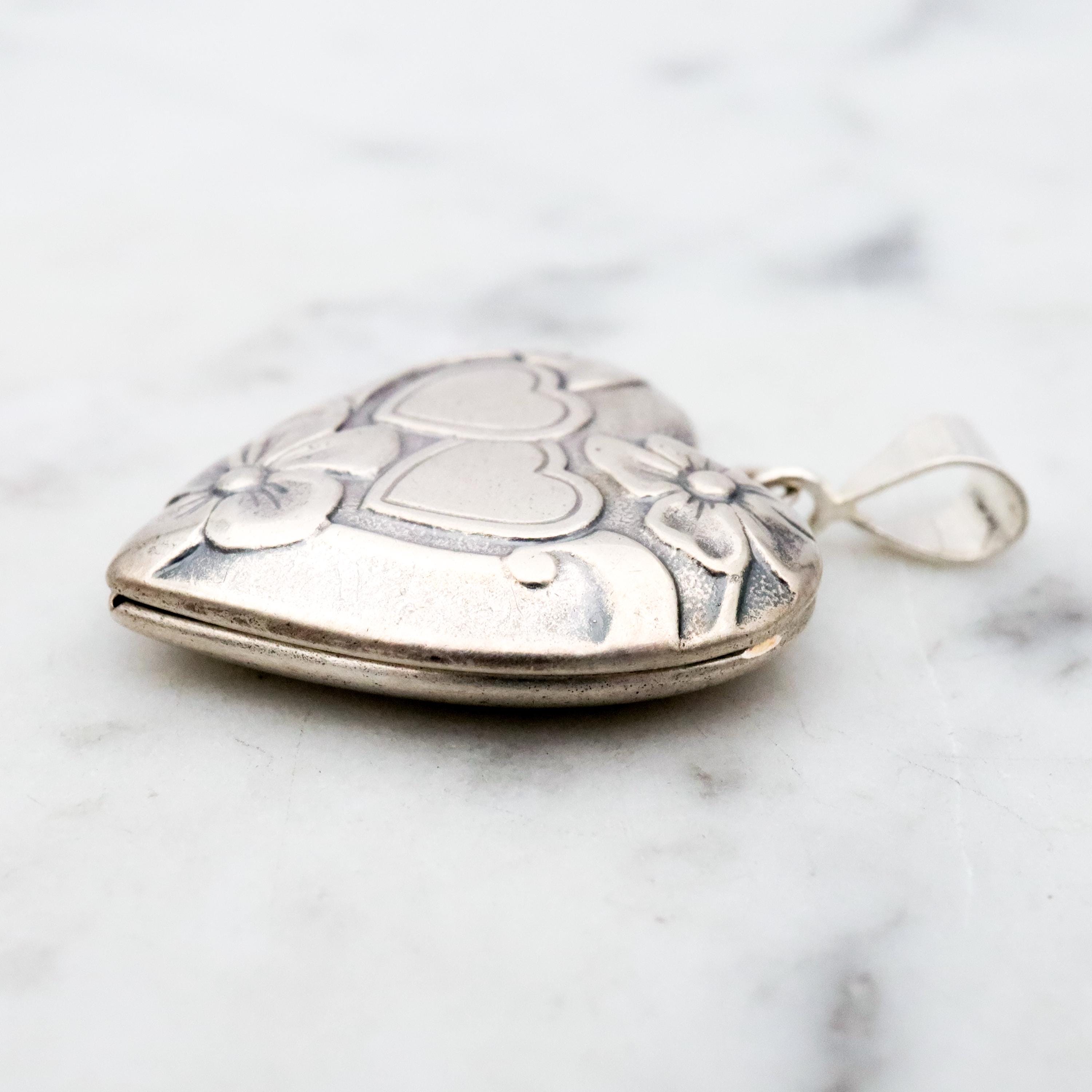 Antique sterling sweetheart locket pendant