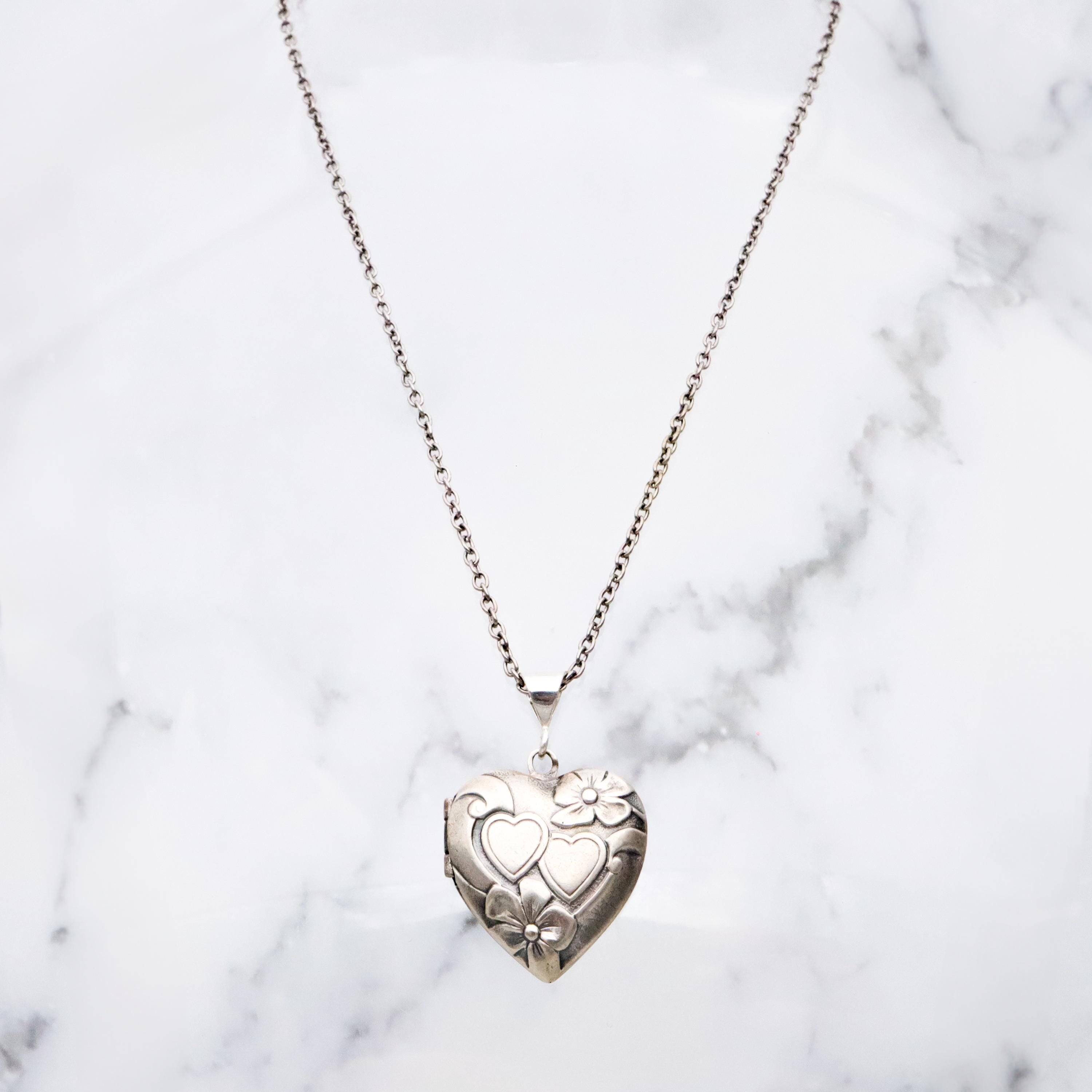 Antique sterling sweetheart locket pendant