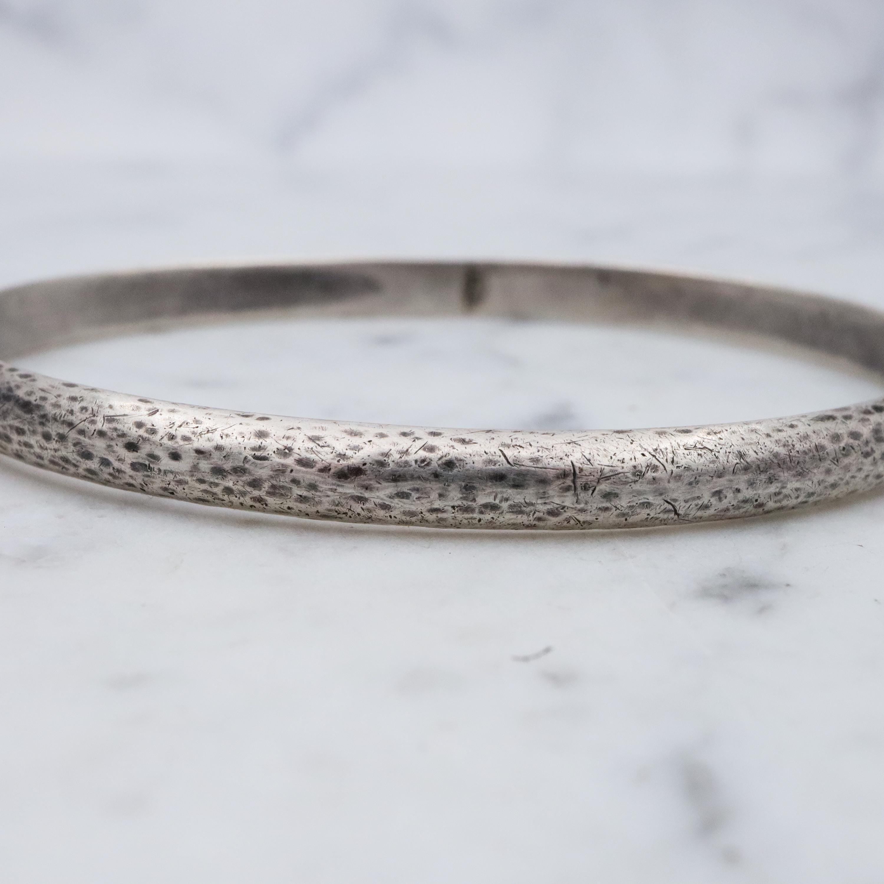 Mid Century hand hammered solid sterling oval bangle