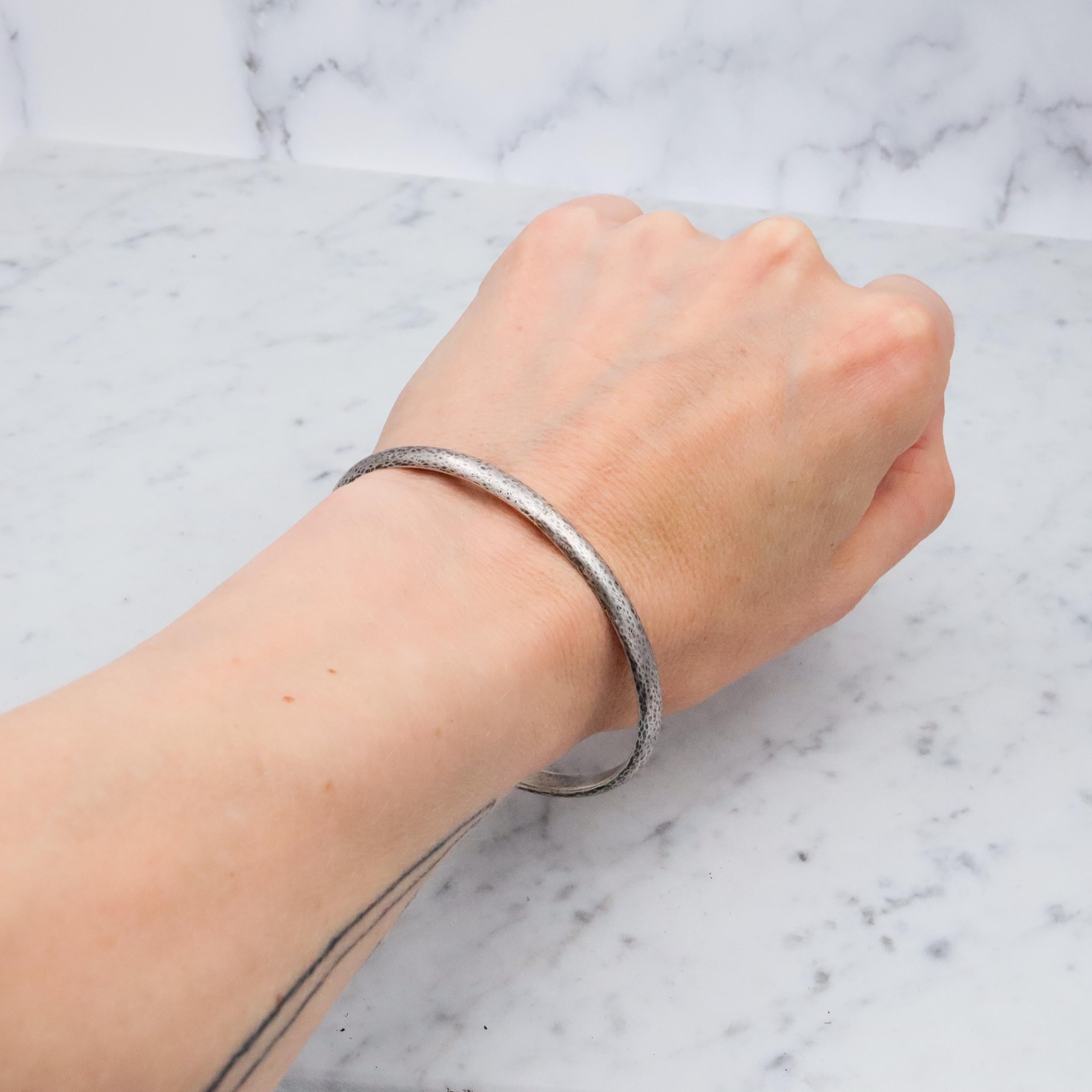 Mid Century hand hammered solid sterling oval bangle