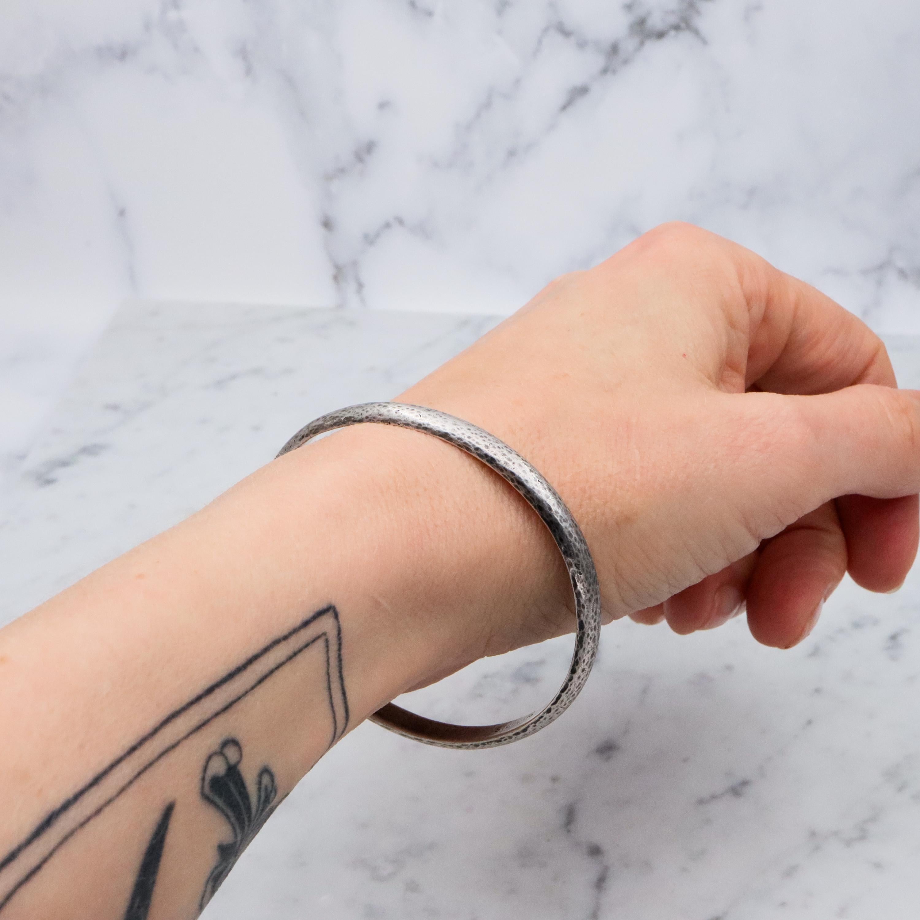 Mid Century hand hammered solid sterling oval bangle