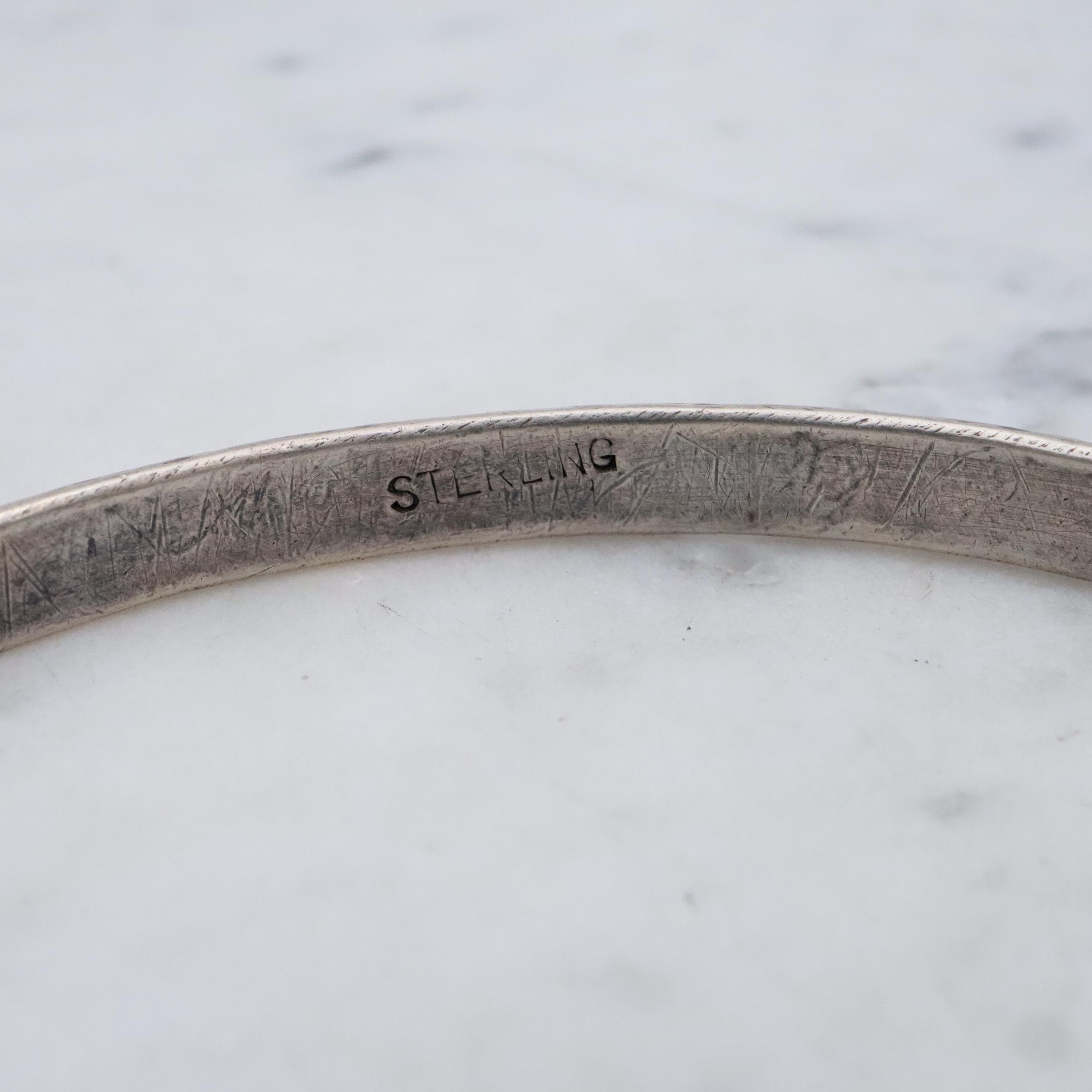 Mid Century hand hammered solid sterling oval bangle