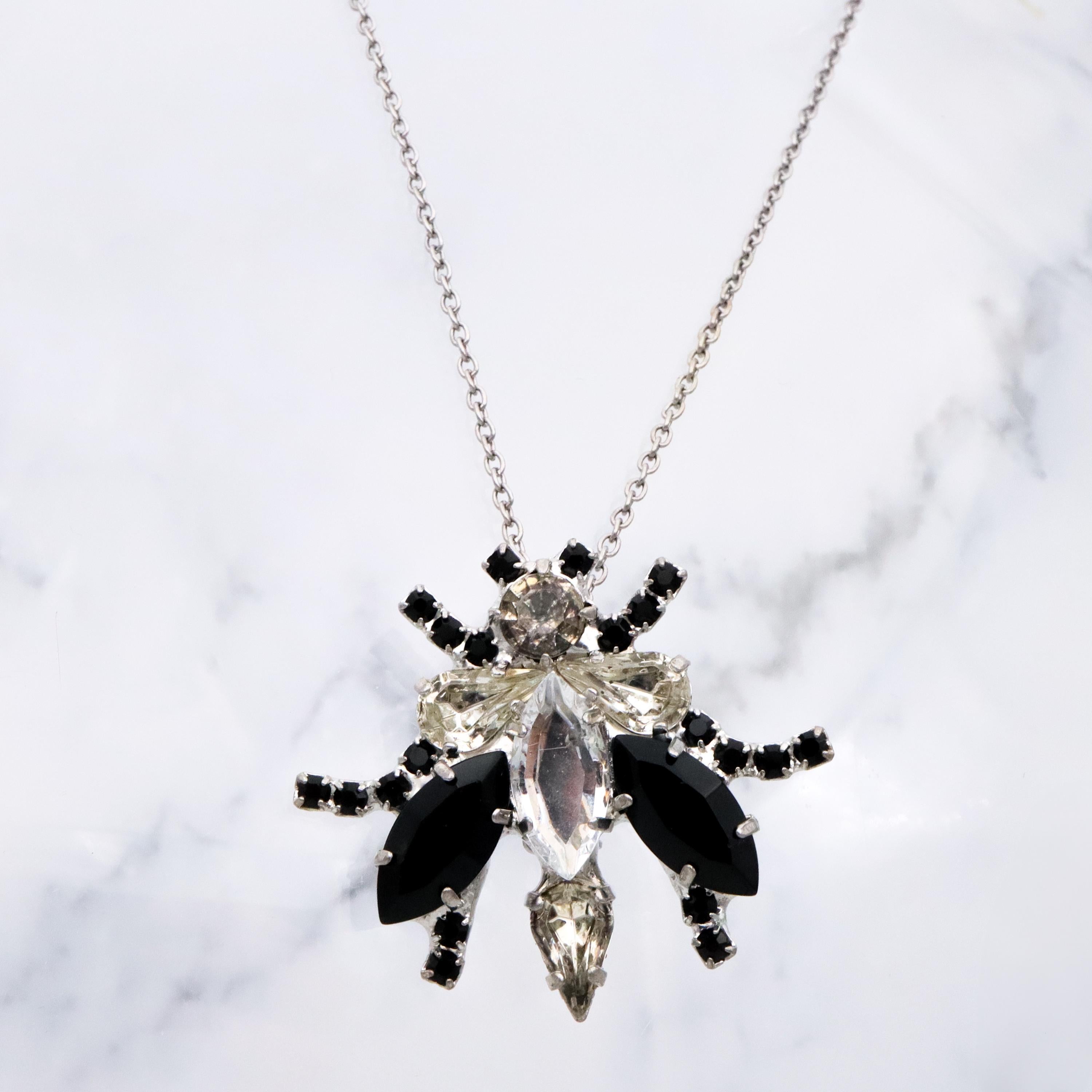 Vintage black & clear rhinestone bug brooch