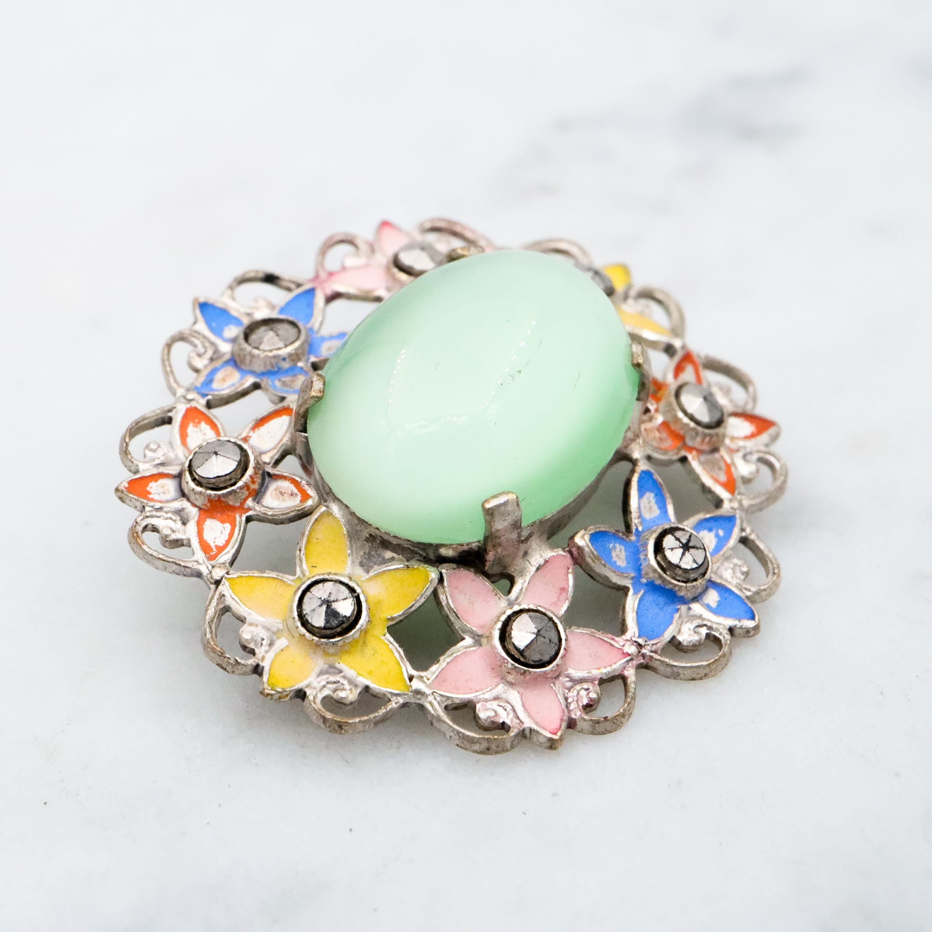 Antique Art Deco green cats eye enamel flower brooch
