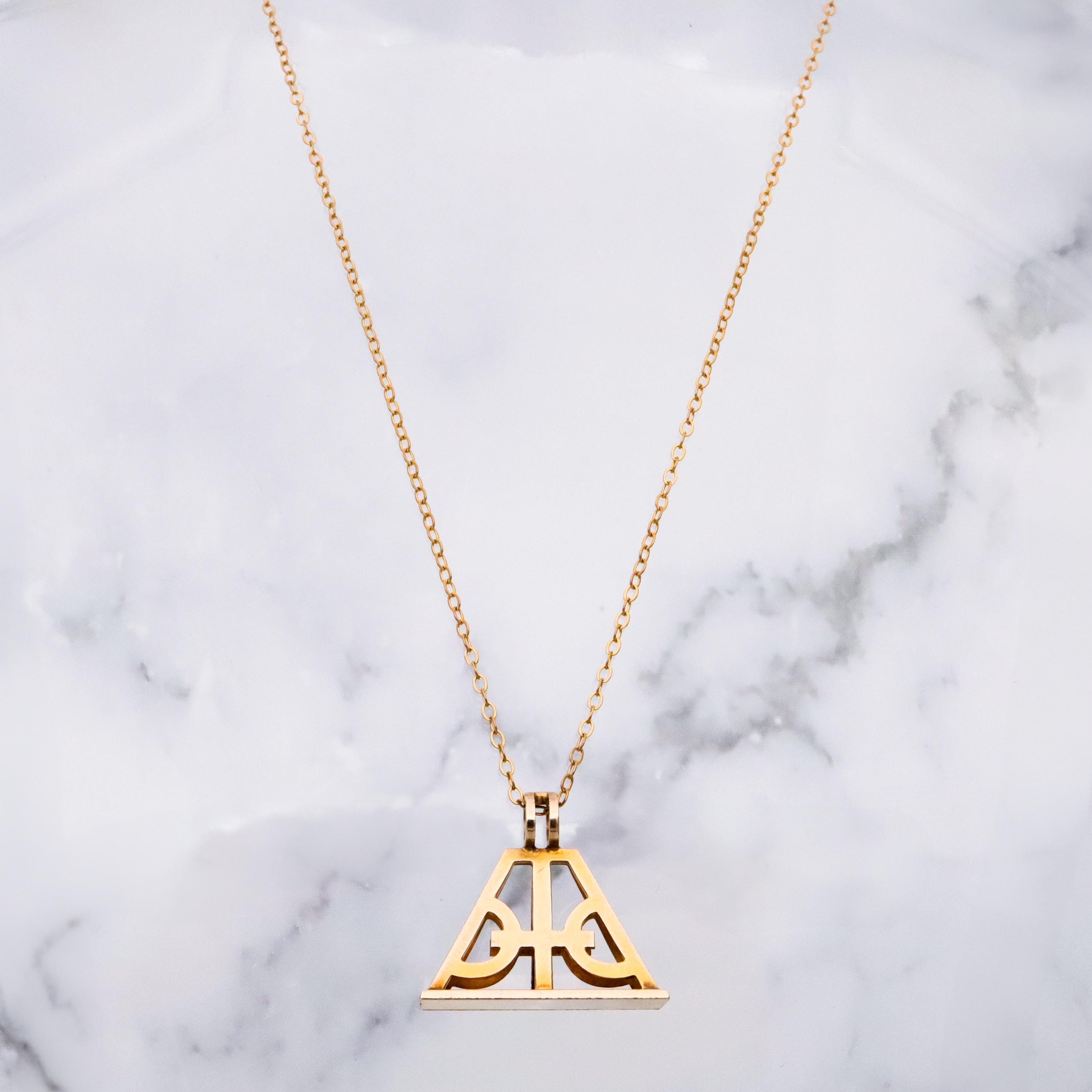 Antique Victorian 10k gold geometric cutout fob pendant