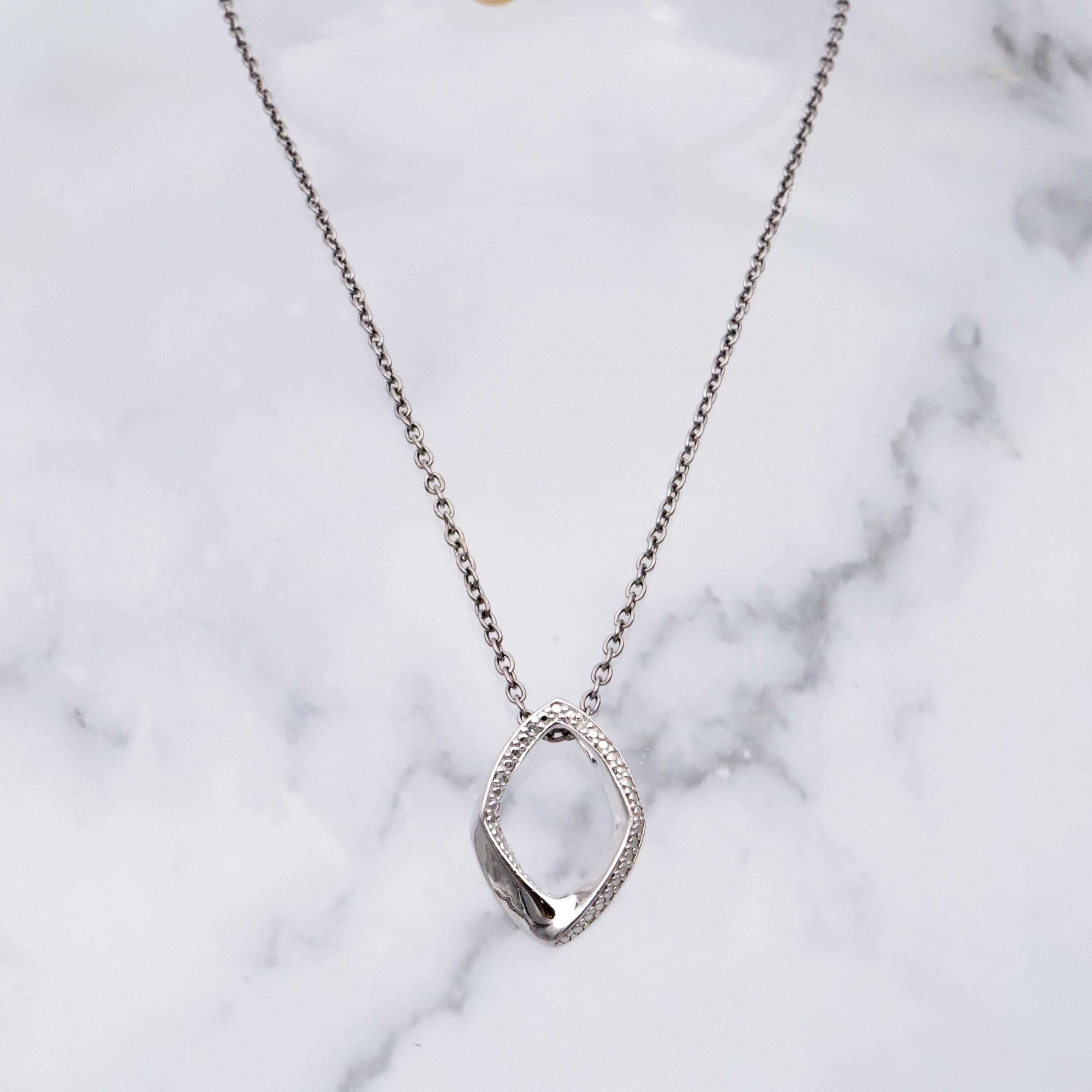 Modern Vintage sterling elongated navette pendant with diamond accents
