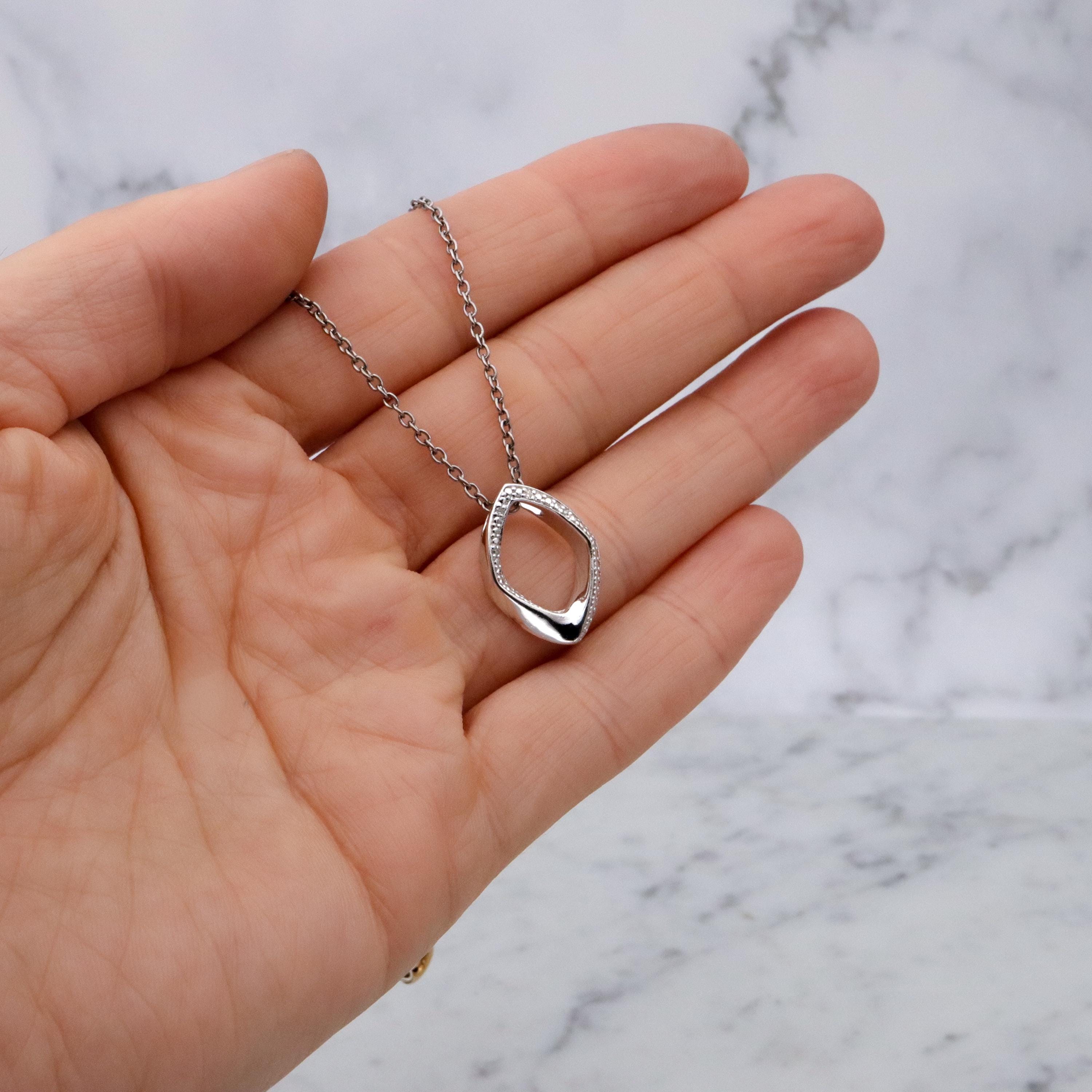 Modern Vintage sterling elongated navette pendant with diamond accents