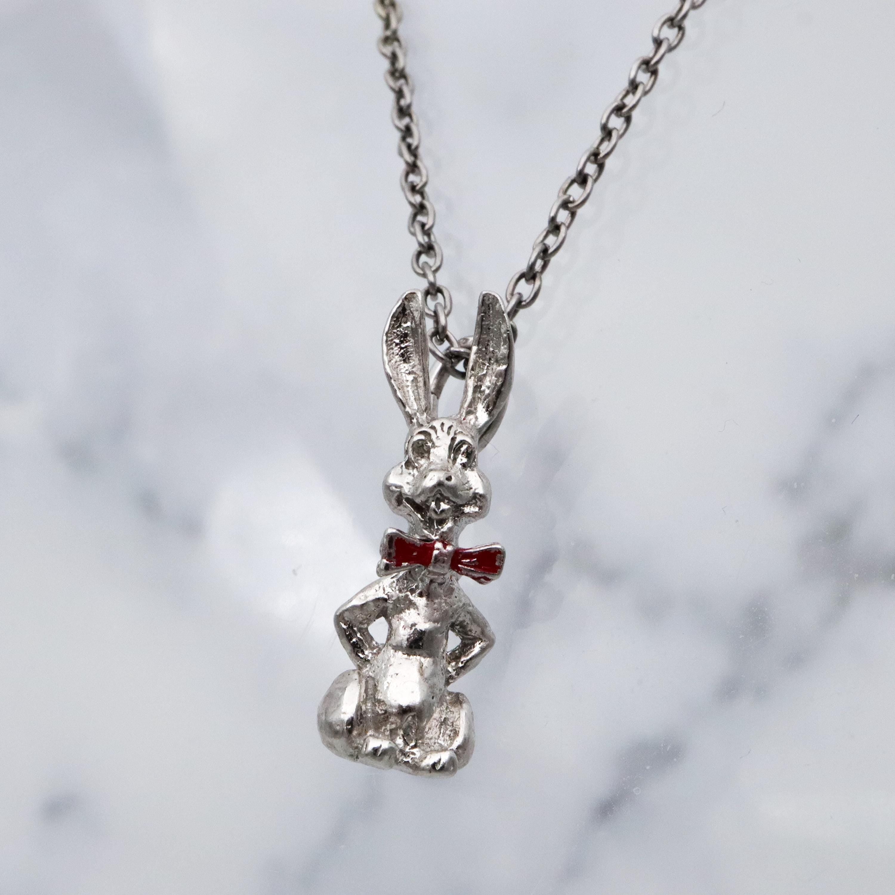 Vintage sterling seated bunny with red bowtie & nodding head