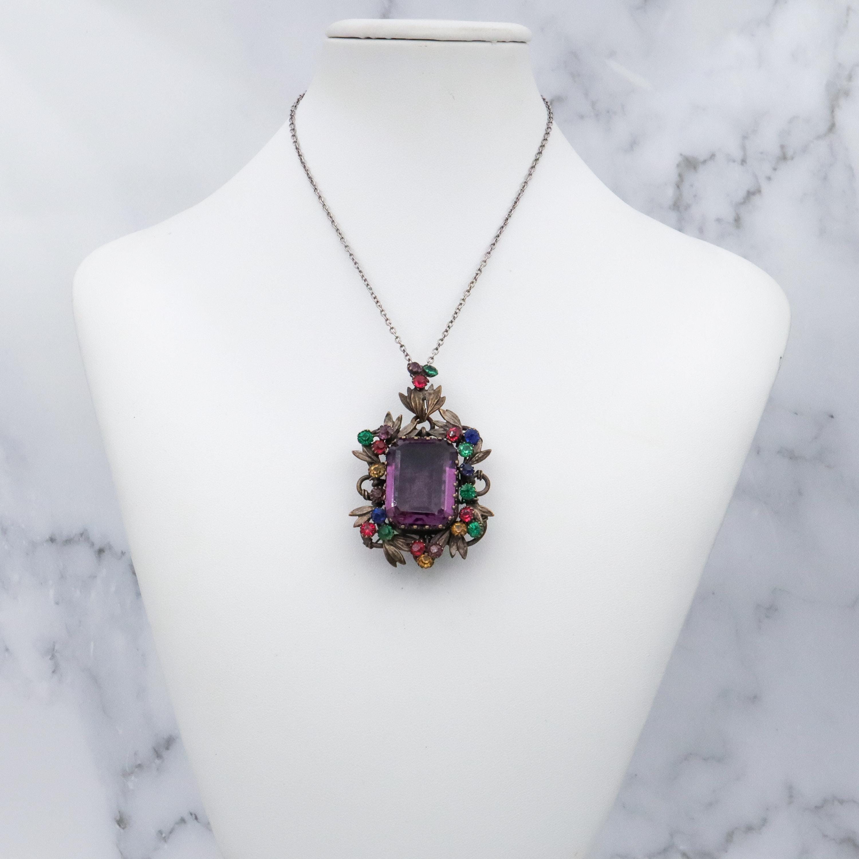 Antique harlequin Czech crystal faux amethyst floral locket pendant