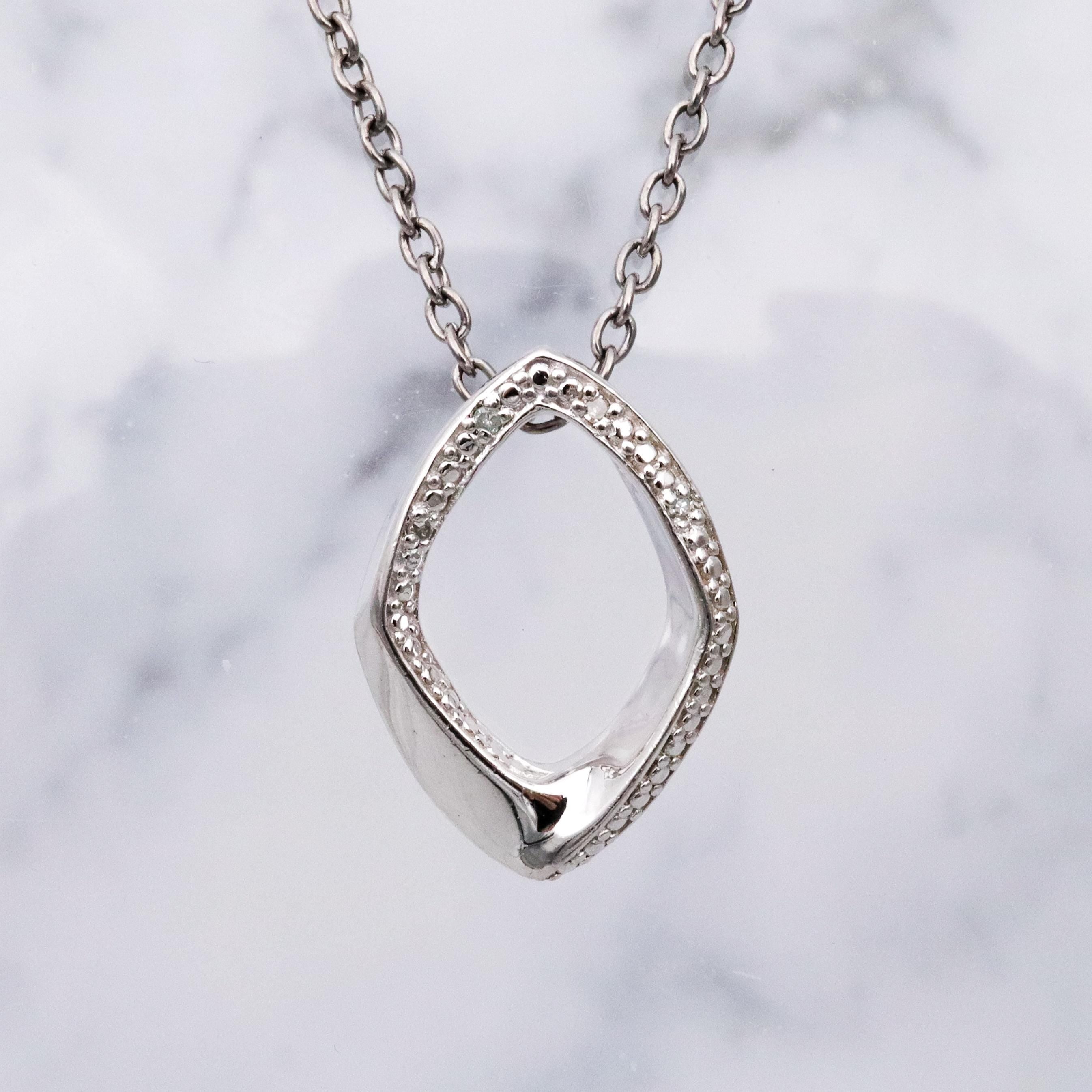 Modern Vintage sterling elongated navette pendant with diamond accents