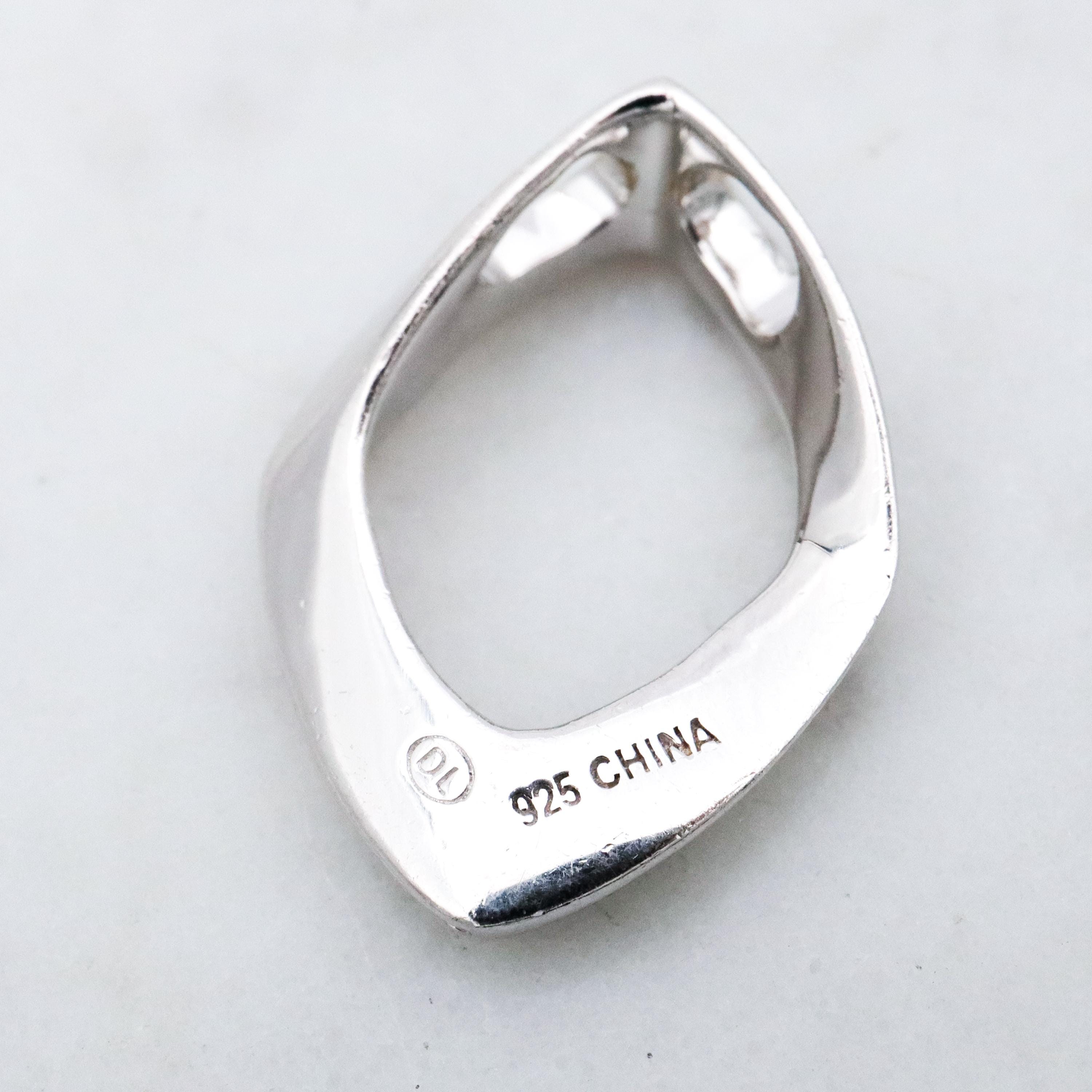 Modern Vintage sterling elongated navette pendant with diamond accents