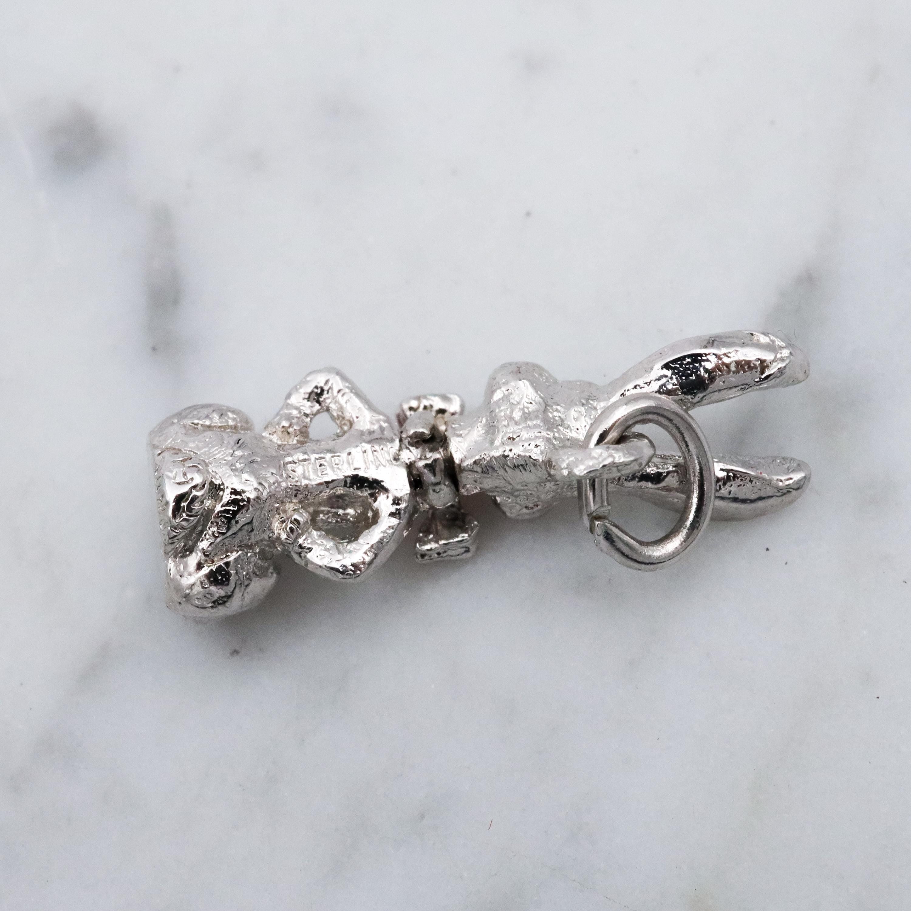 Vintage sterling seated bunny with red bowtie & nodding head