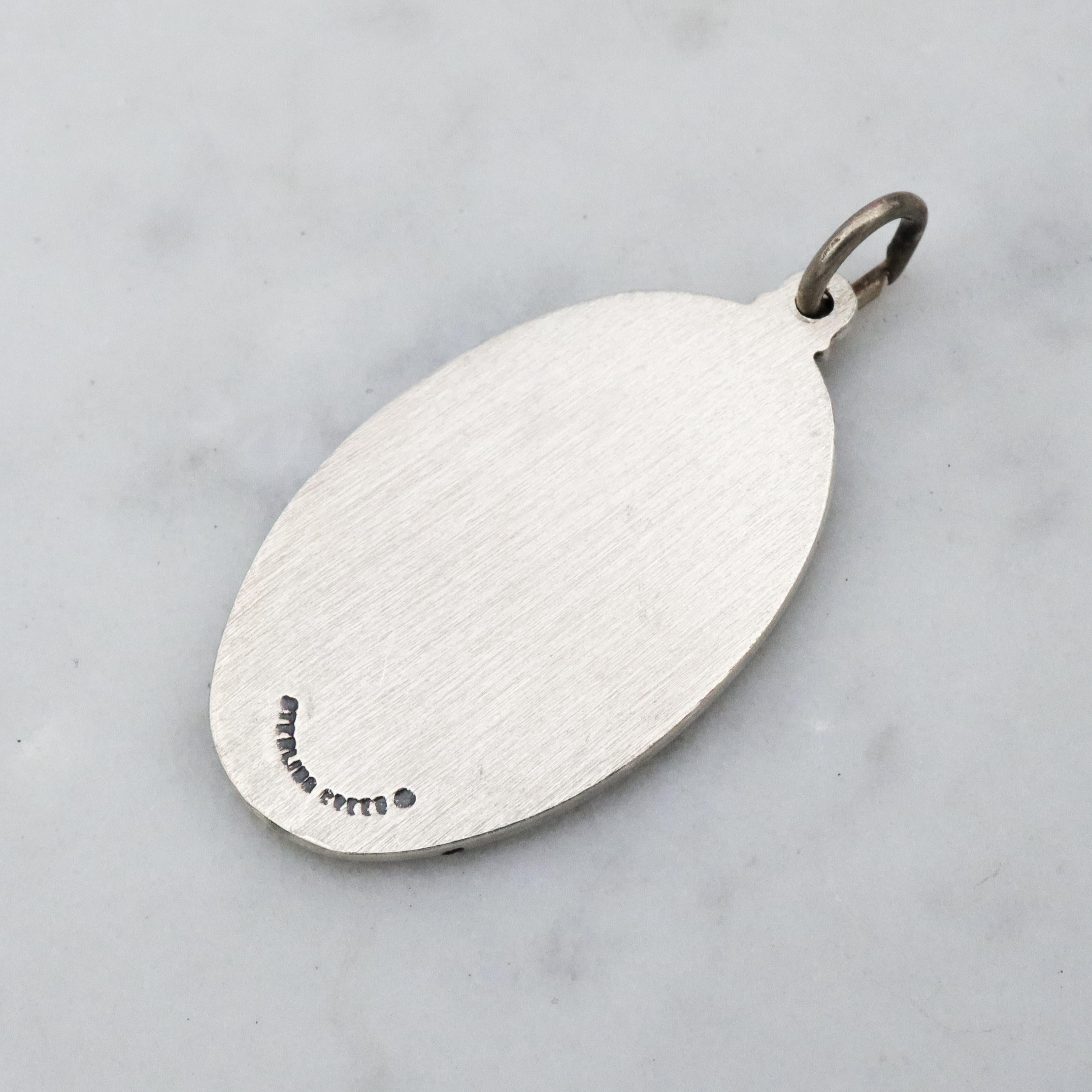 Vintage Creed sterling Saint Daniel medal pendant