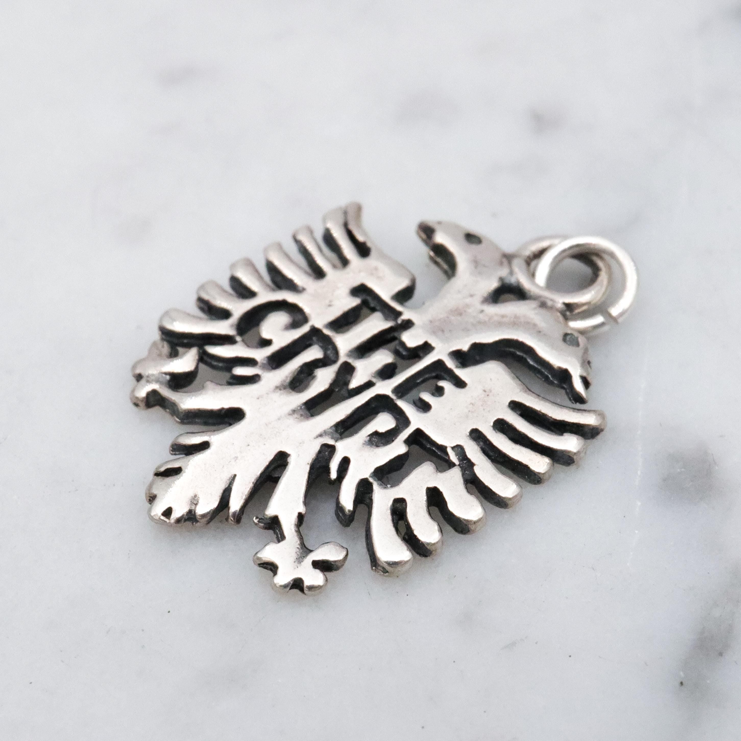 Vintage sterling "The Crypt" Seattle double headed eagle pendant