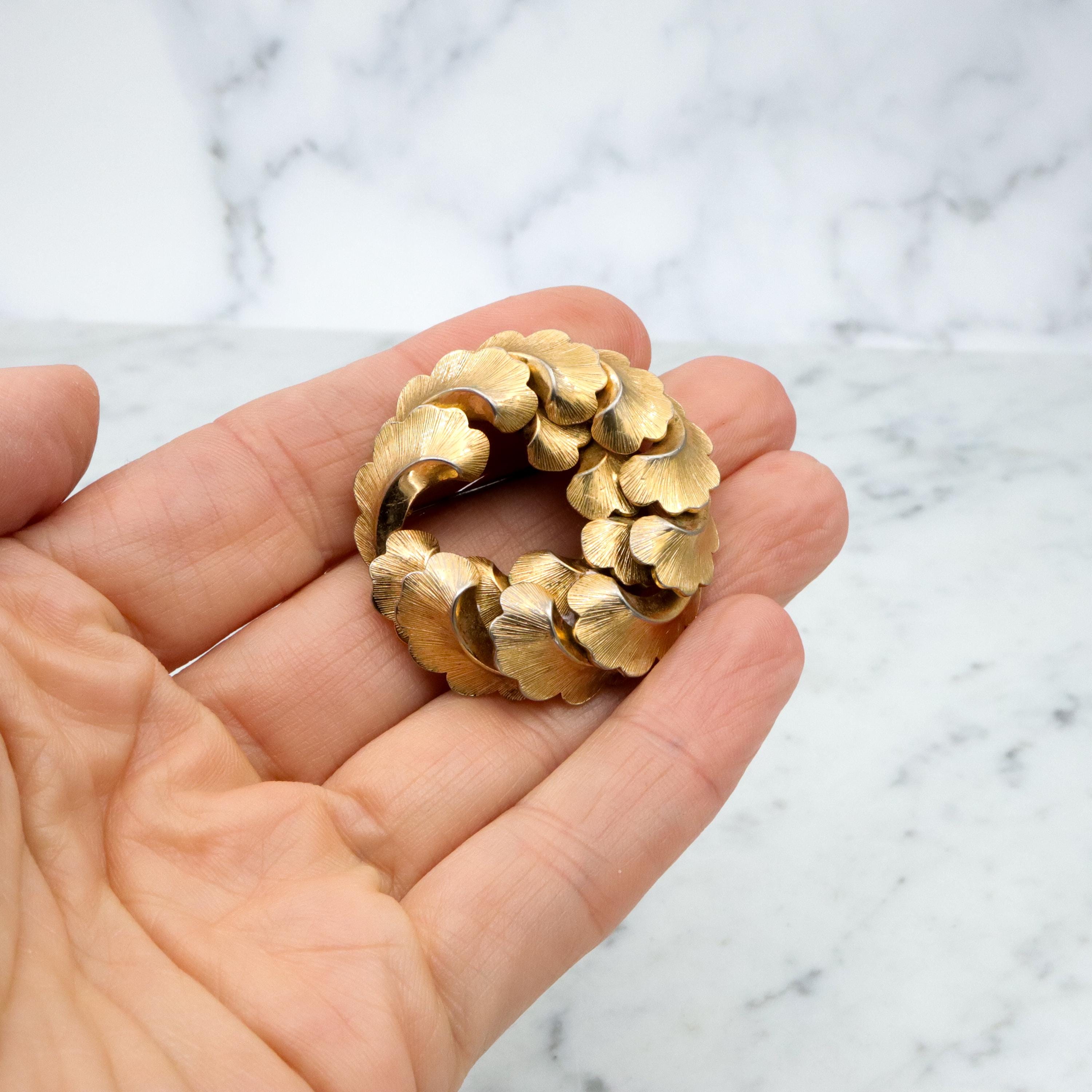 1958 Henkel & Grosse gold plated feather wreath brooch