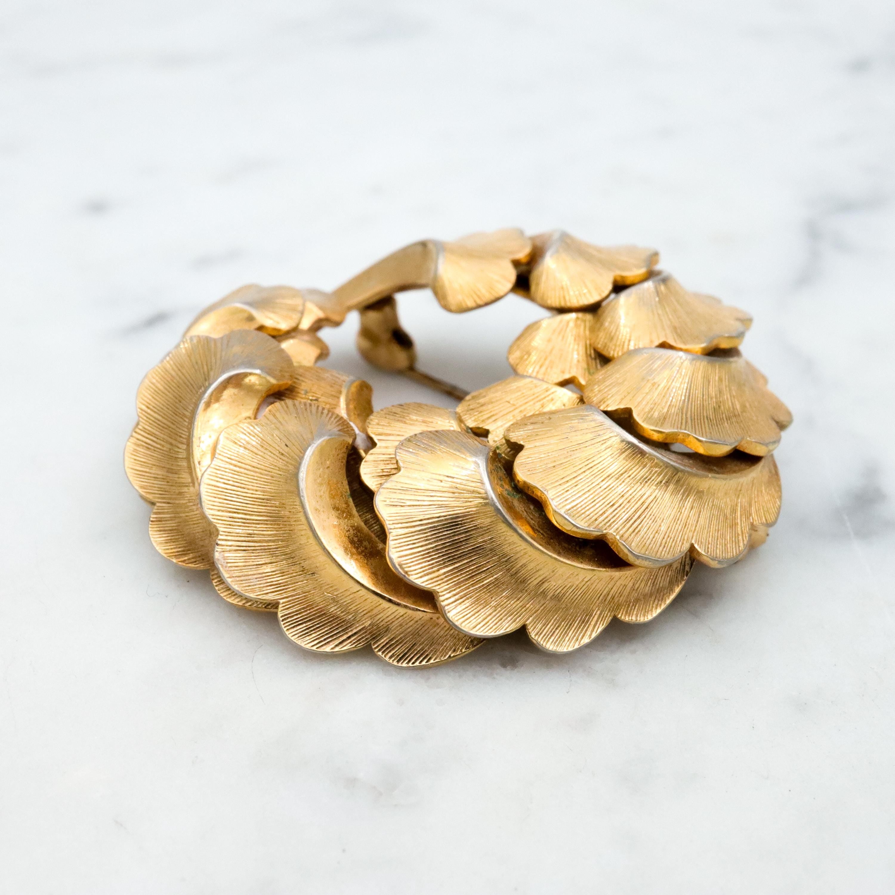 1958 Henkel & Grosse gold plated feather wreath brooch