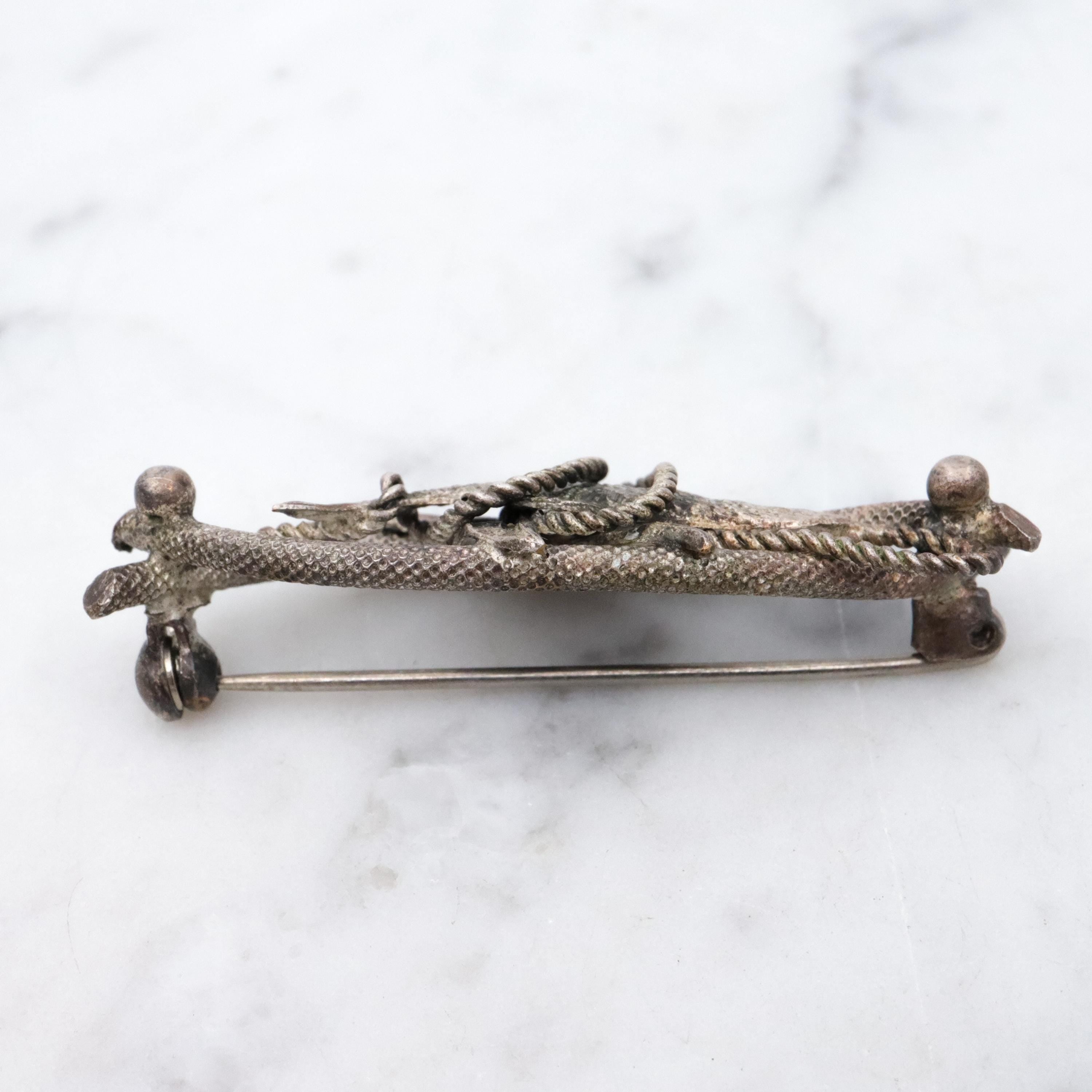 Vintage 1950s Western Germany "fish caught on a rope" silver plated brooch