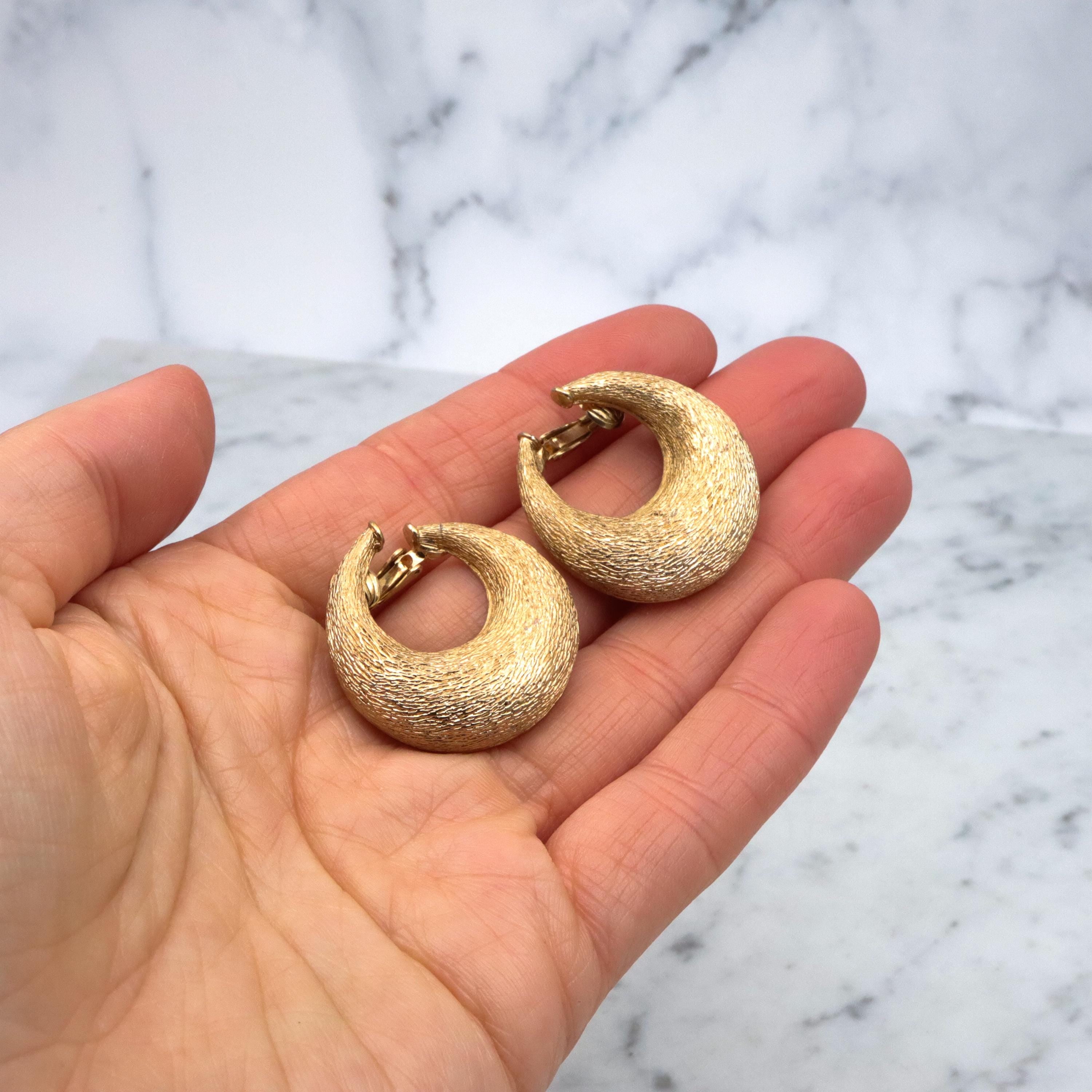 Vintage 70s Ciner textured gold plated flattened hoop huggie clip-on earrings