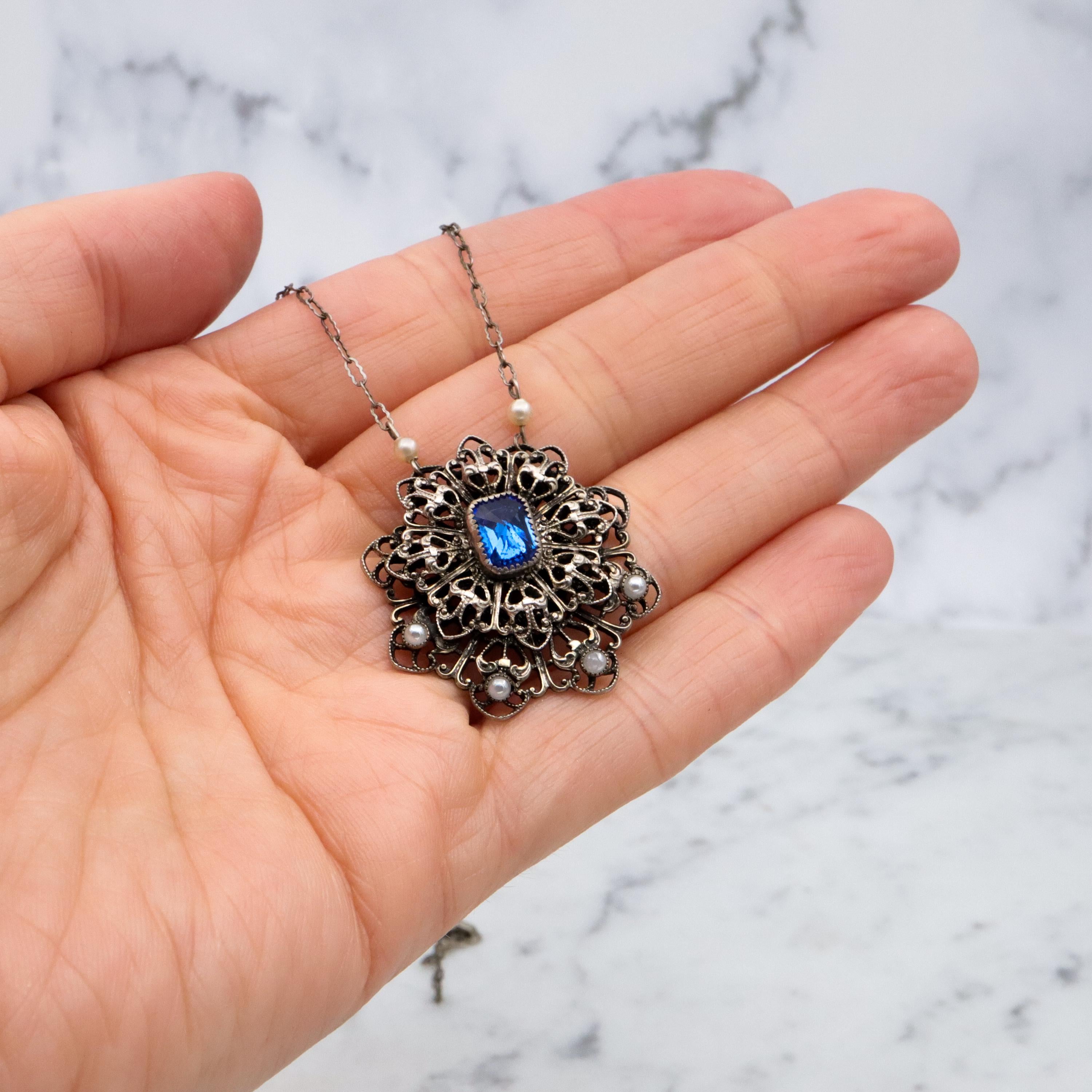 1950s silver tone filigree sapphire crystal & faux pearl flower pendant necklace