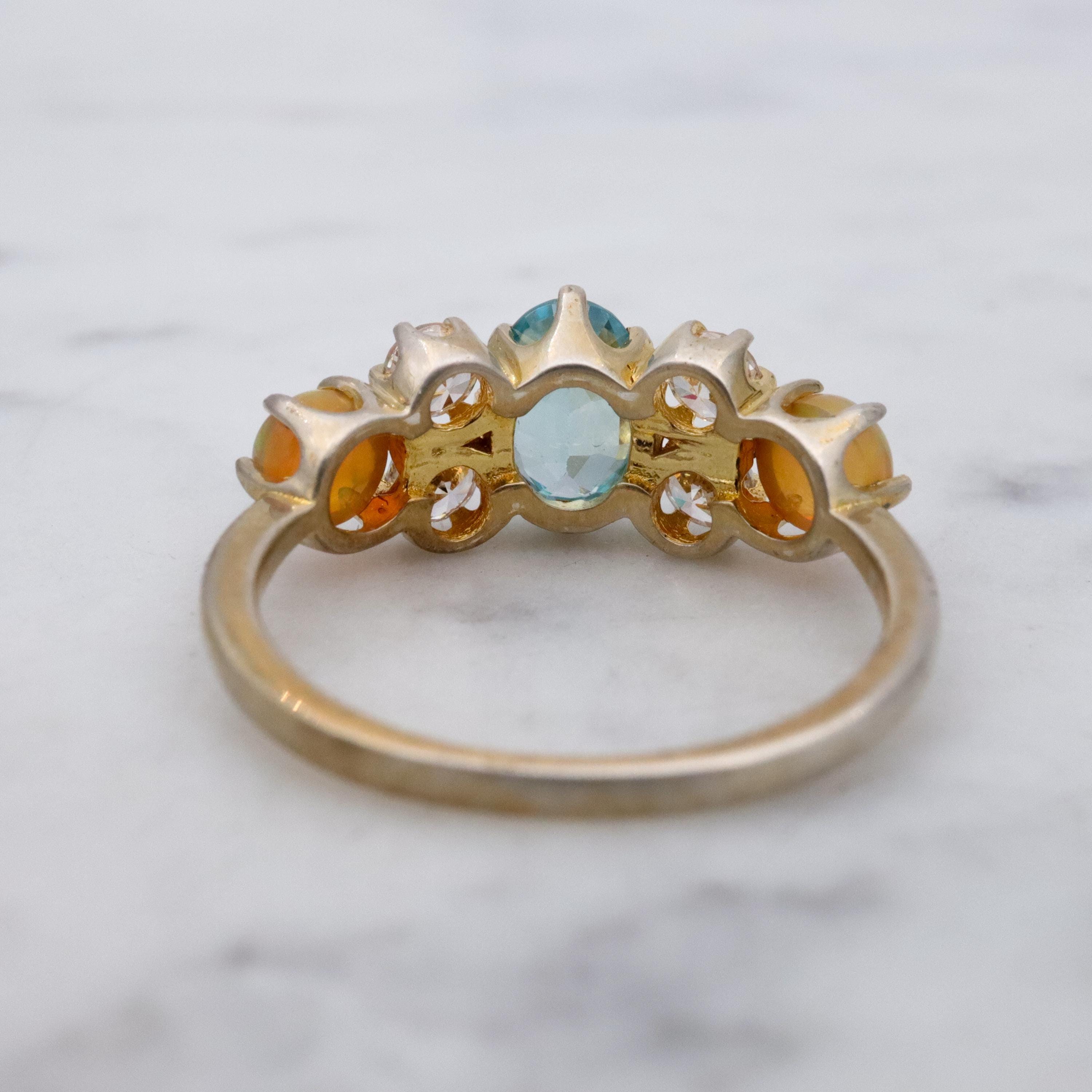 Stauer gold plated sterling blue topaz, fire opal, & cz cocktail ring, sz 6
