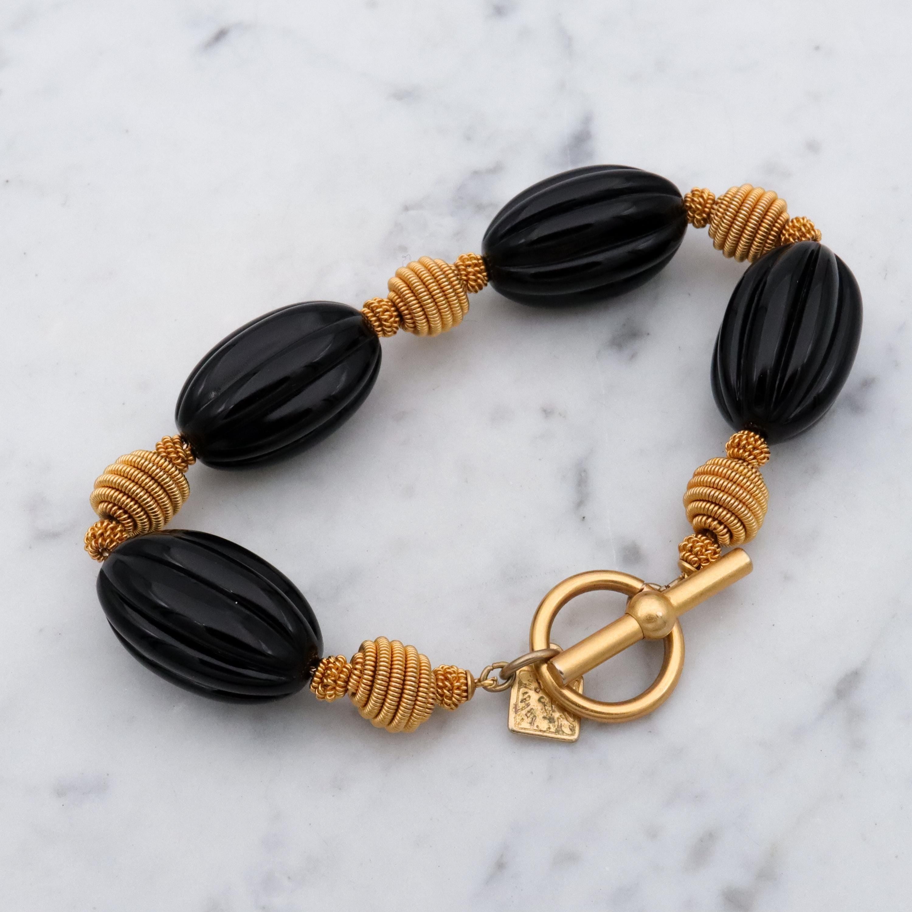 90s Anne Klein black & gold beaded bracelet w/toggle clasp