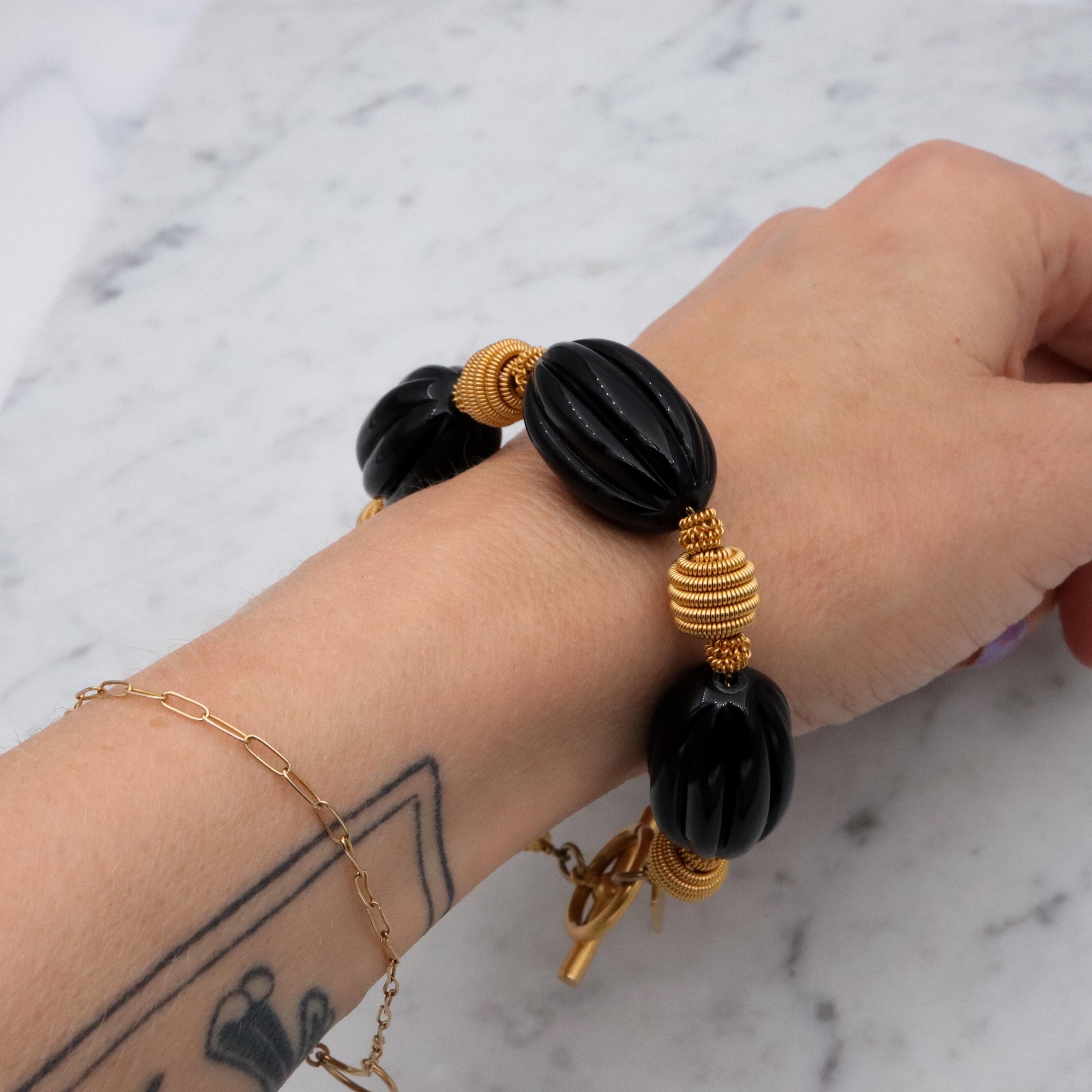 90s Anne Klein black & gold beaded bracelet w/toggle clasp