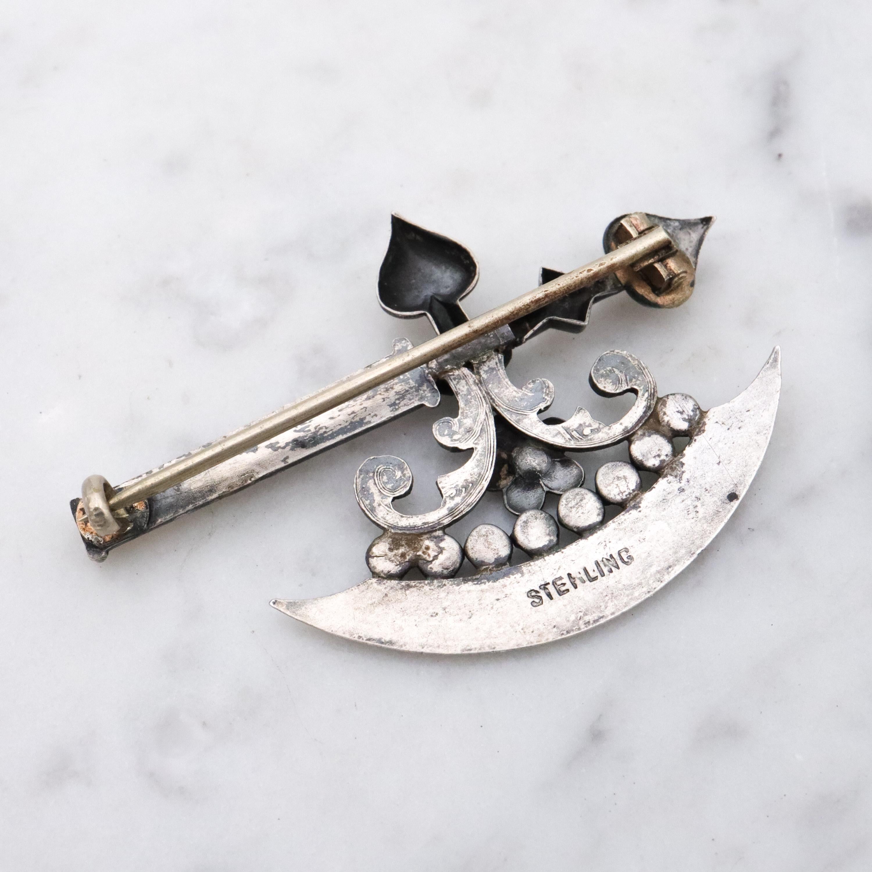 Rare Antique Victorian sterling fancy battle axe brooch with emerald paste gems