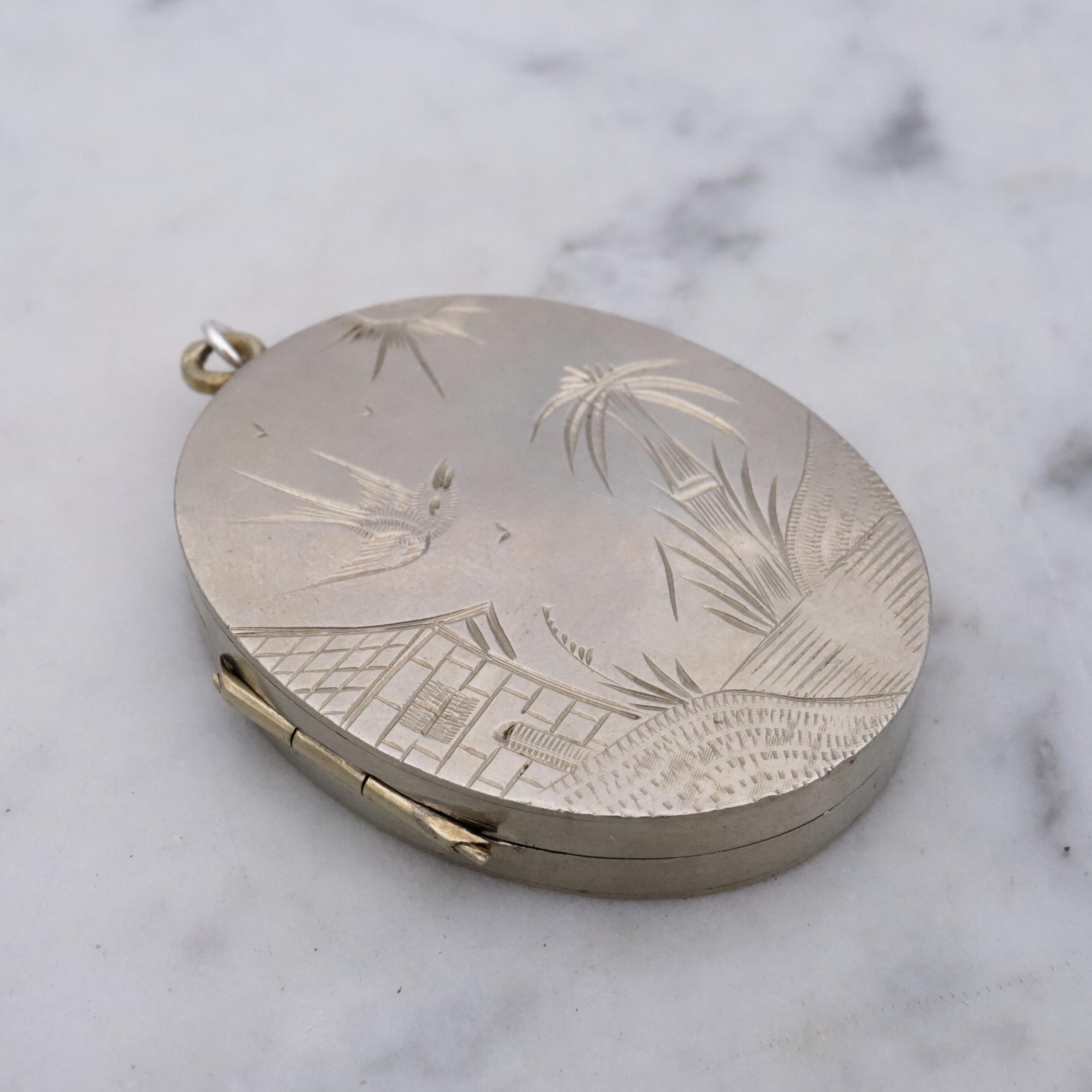 Victorian silver plated Aesthetic engraved swallow locket