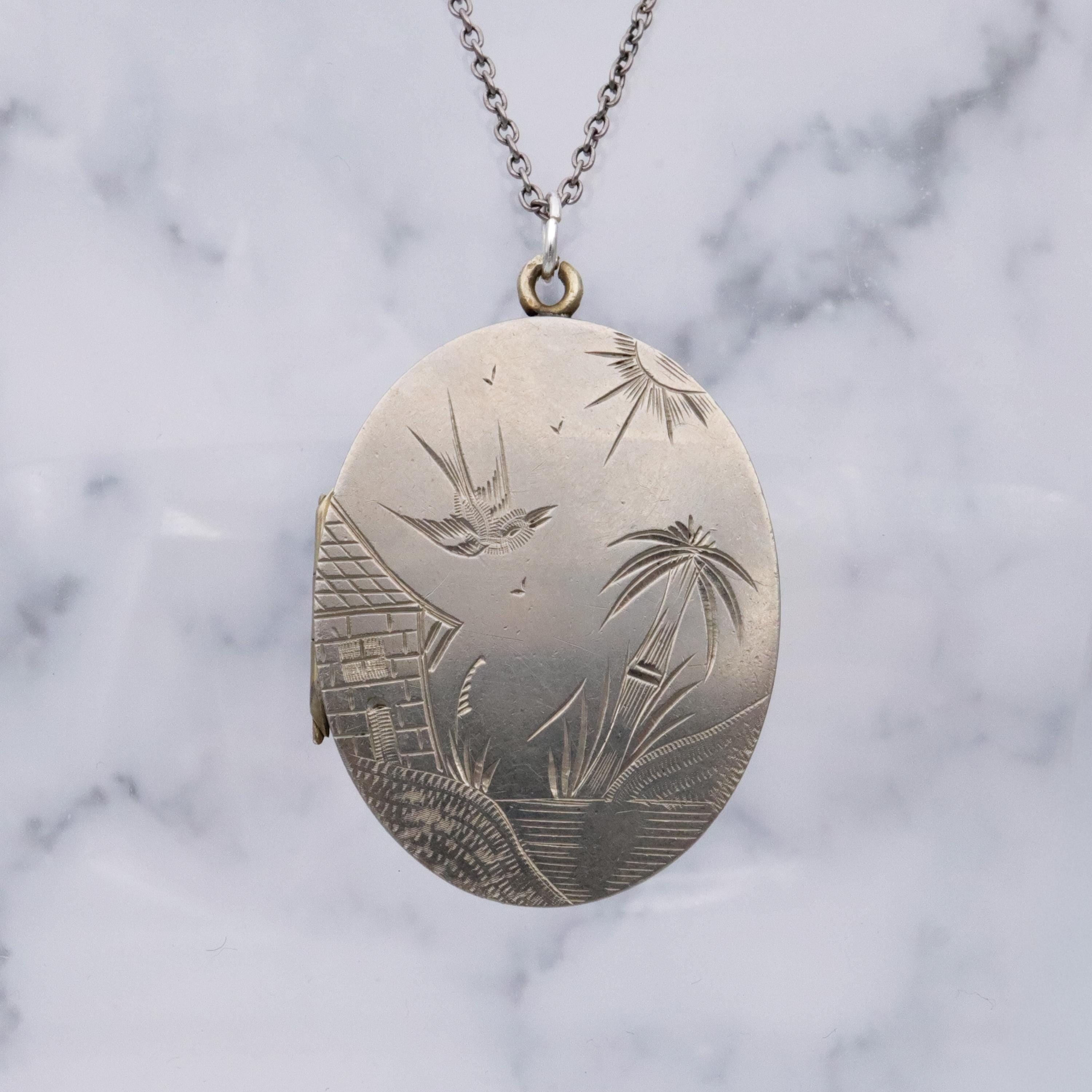 Victorian silver plated Aesthetic engraved swallow locket