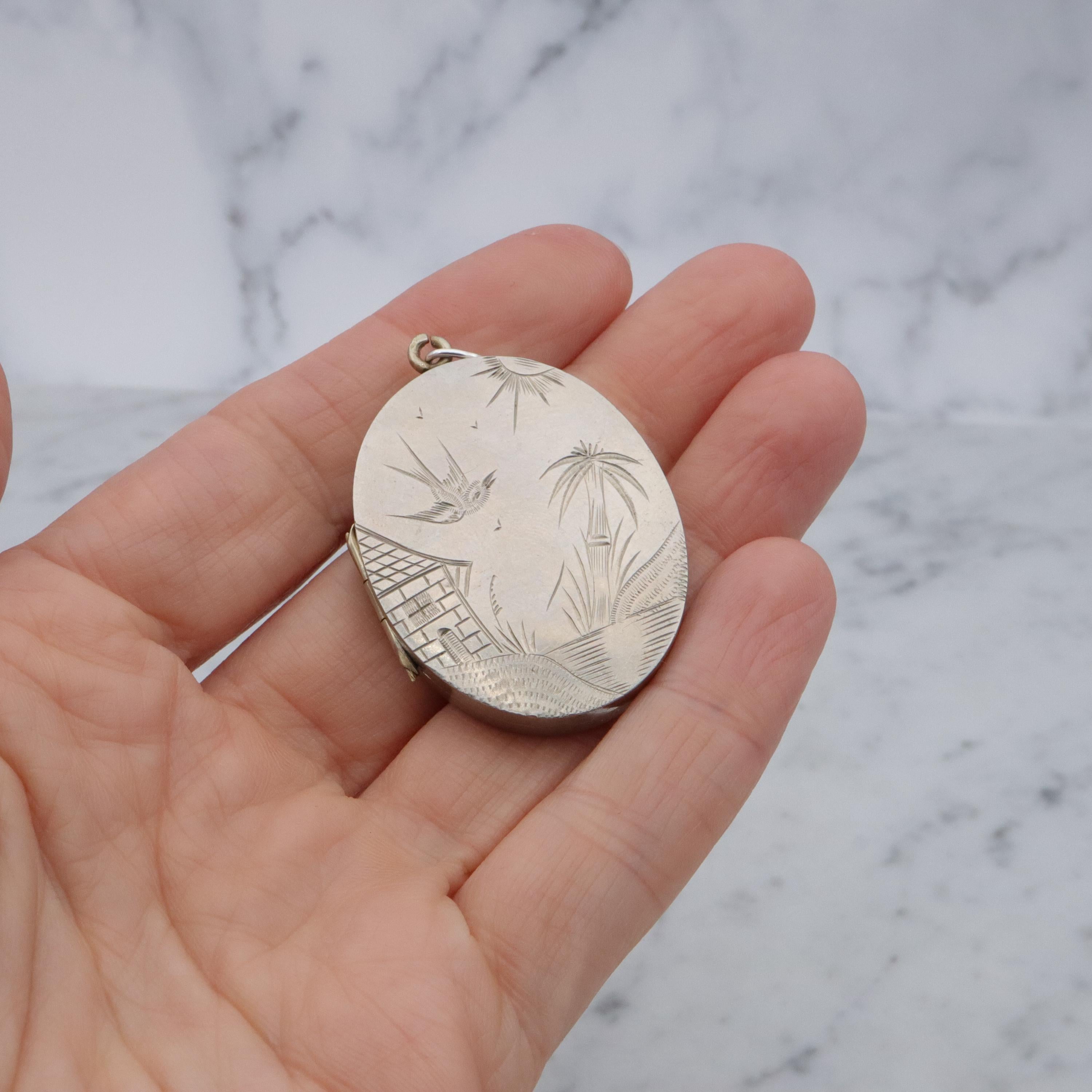 Victorian silver plated Aesthetic engraved swallow locket