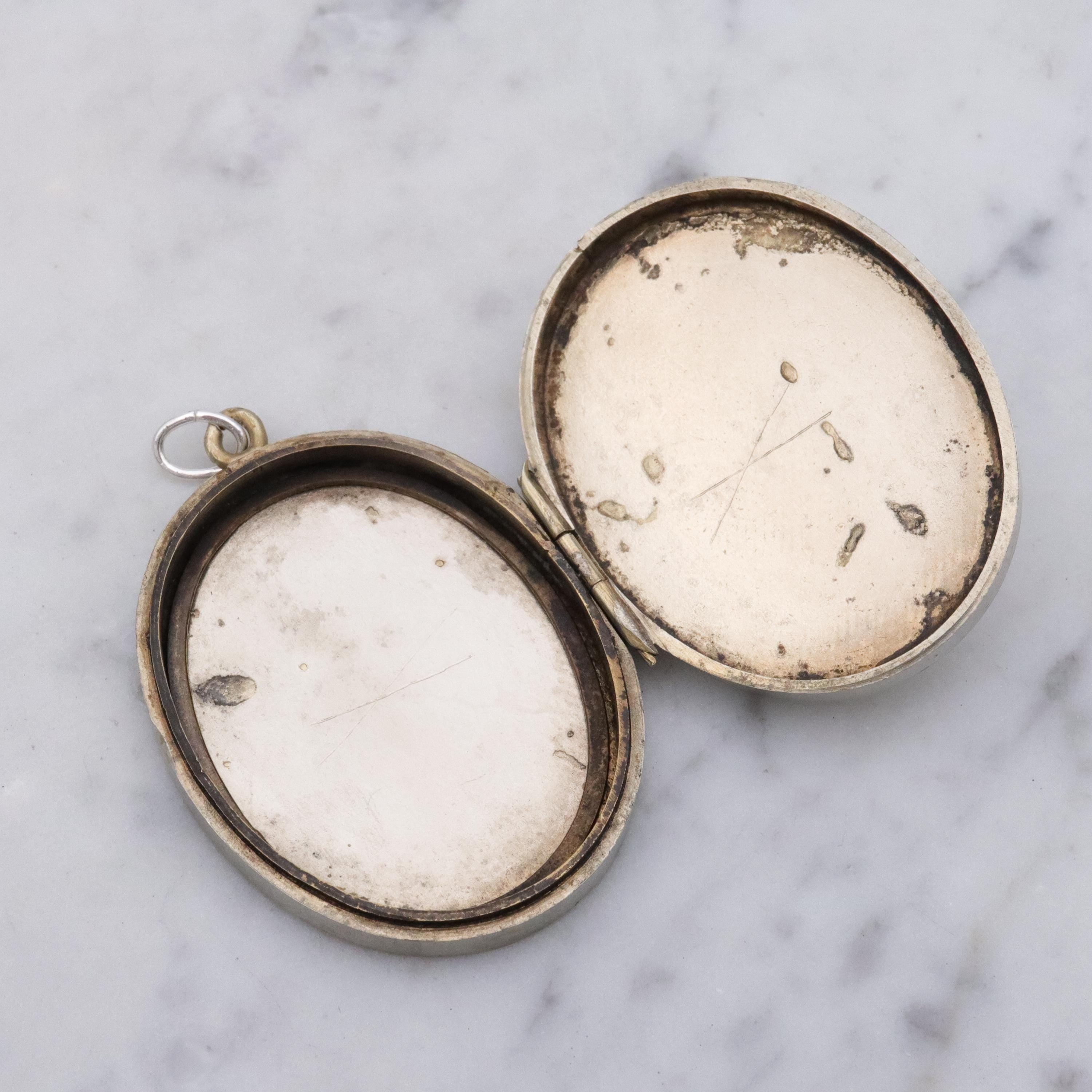 Victorian silver plated Aesthetic engraved swallow locket