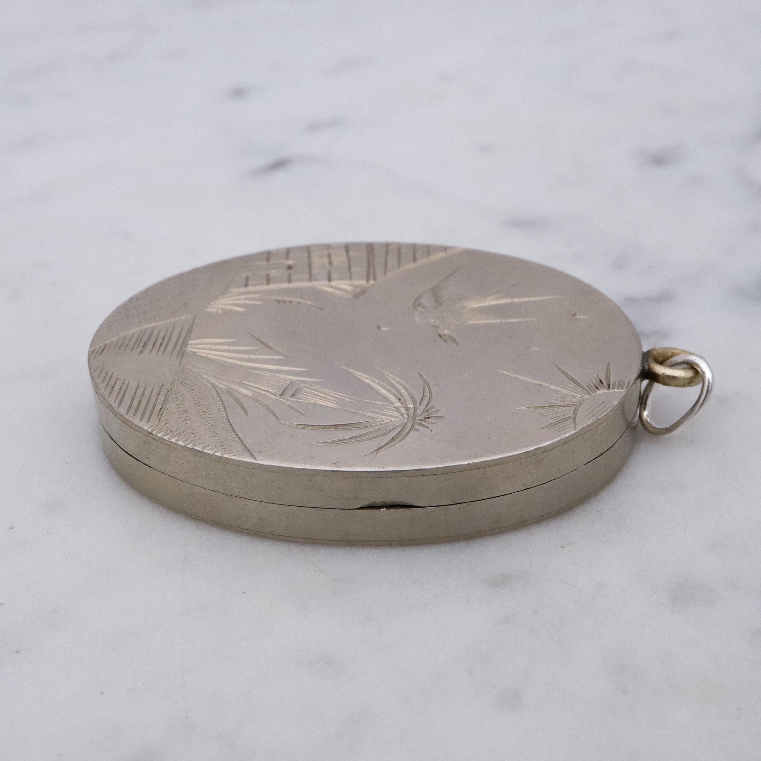 Victorian silver plated Aesthetic engraved swallow locket