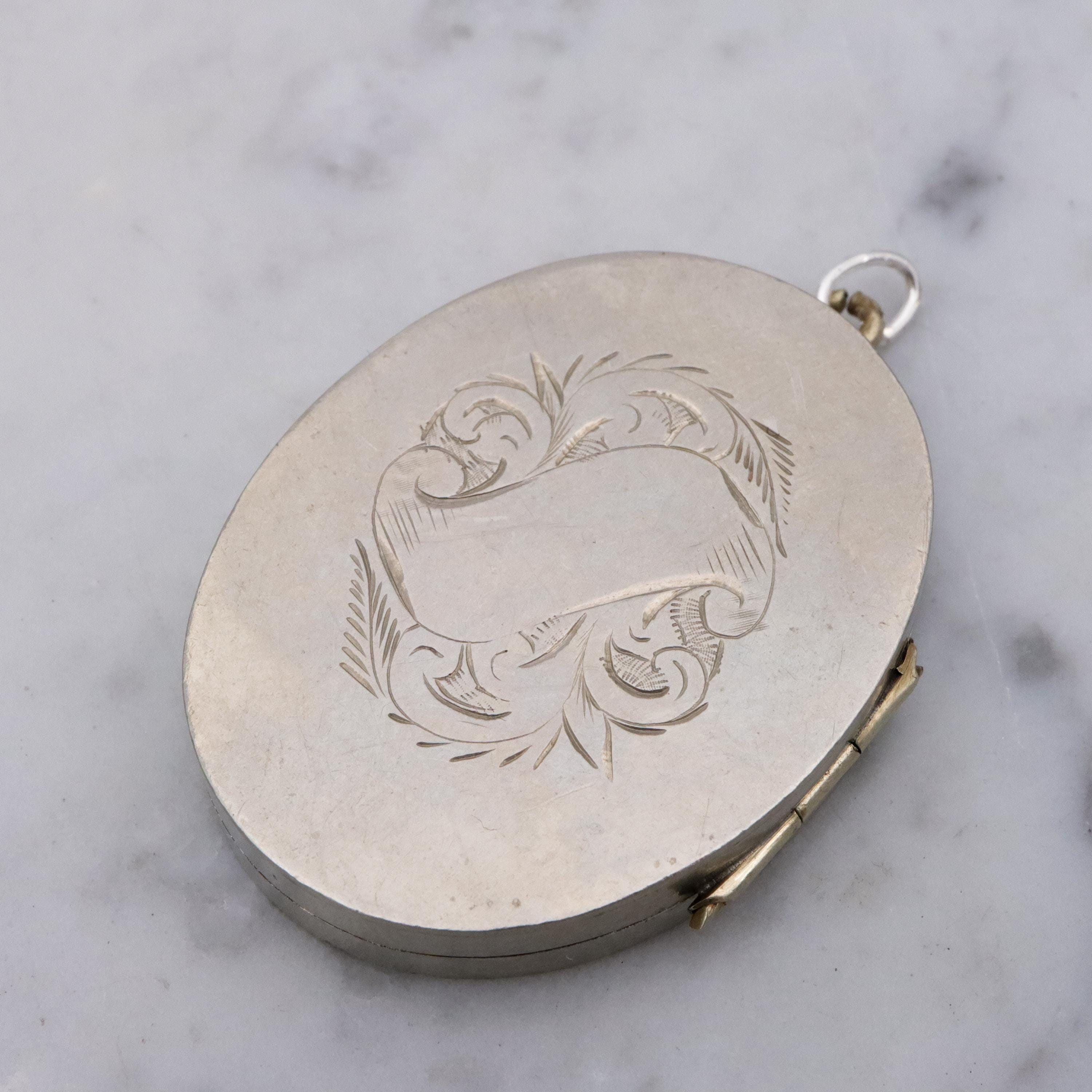 Victorian silver plated Aesthetic engraved swallow locket