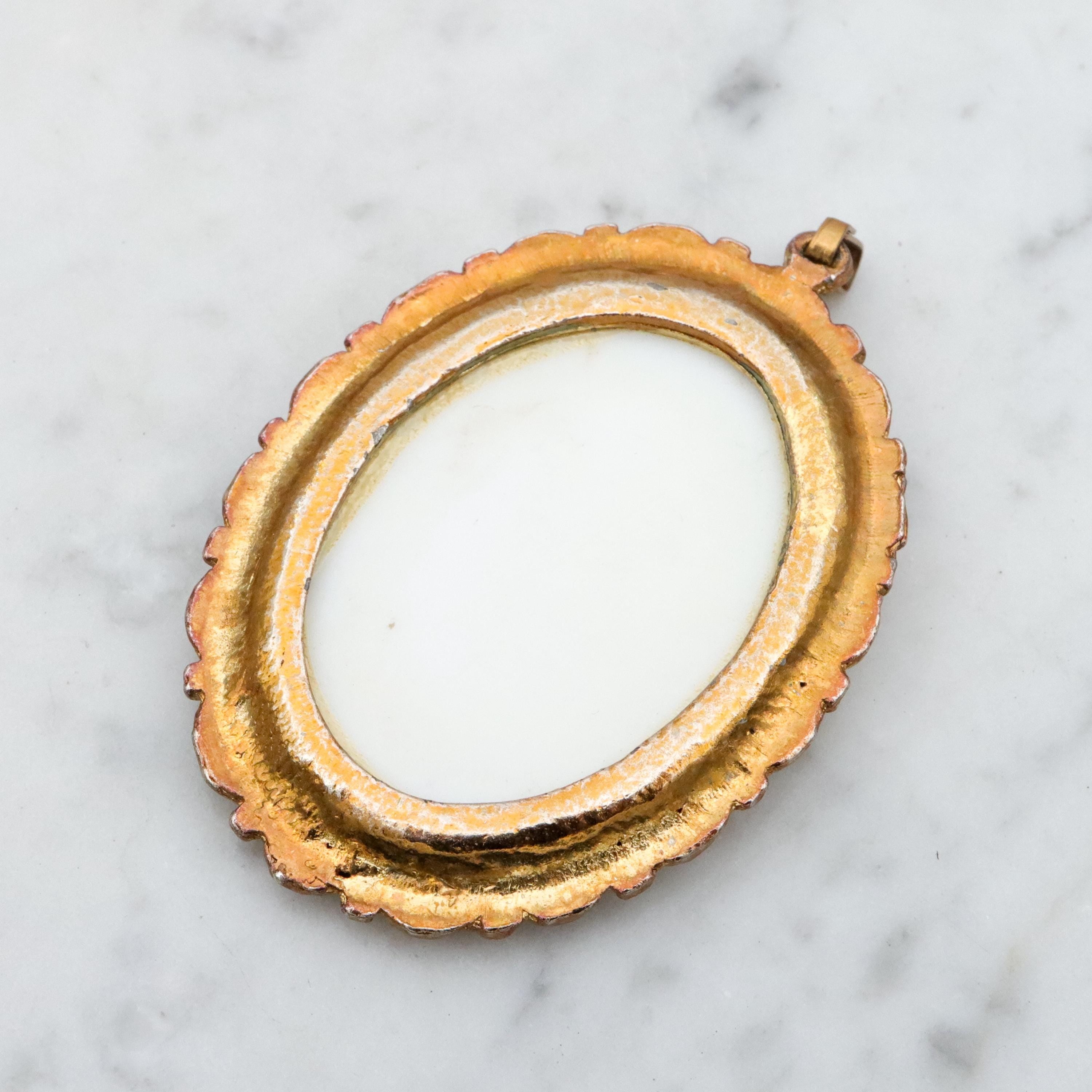 Mid Century gold tone & green glass Egyptian Revival plaque pendant