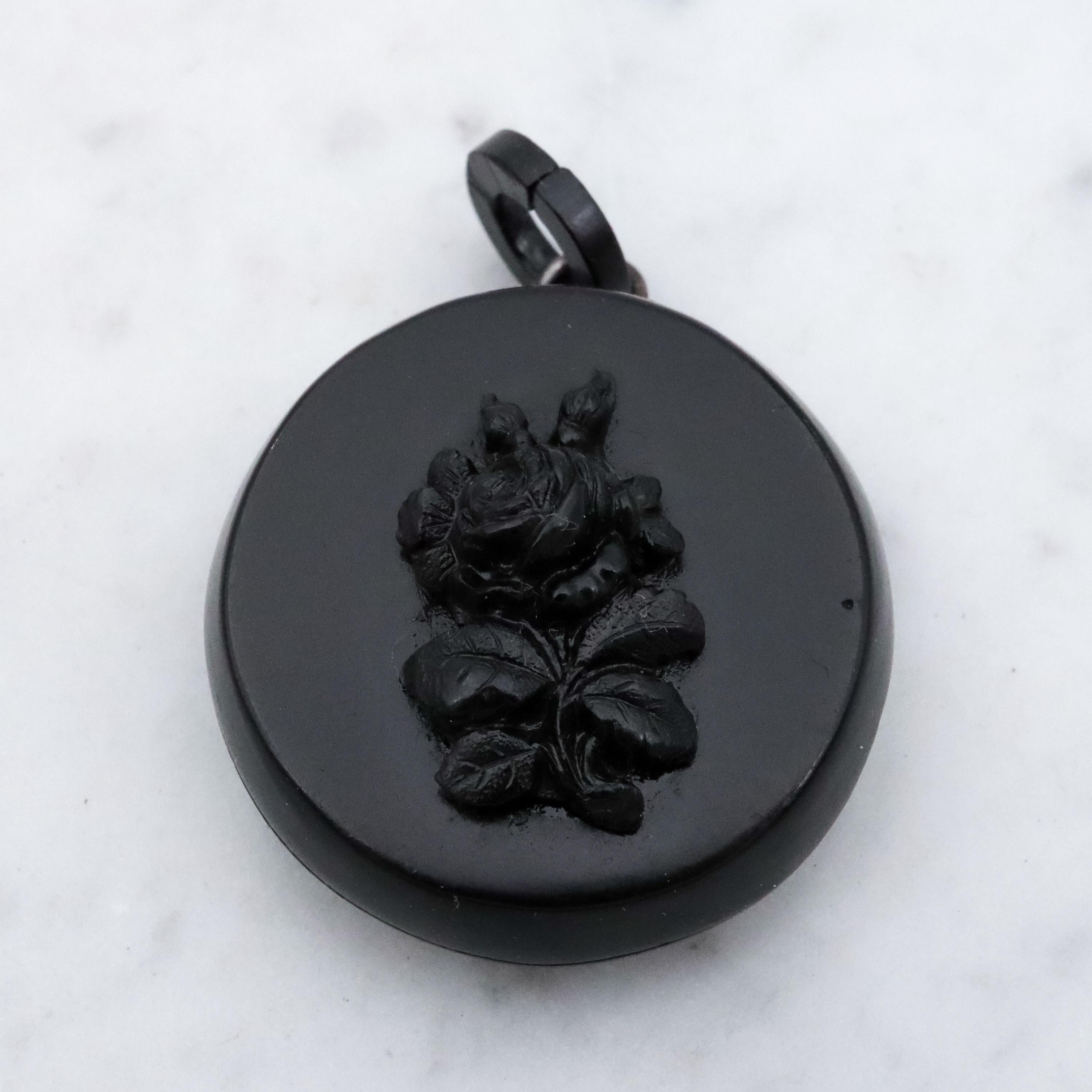 Victorian gutta percha flower round small locket