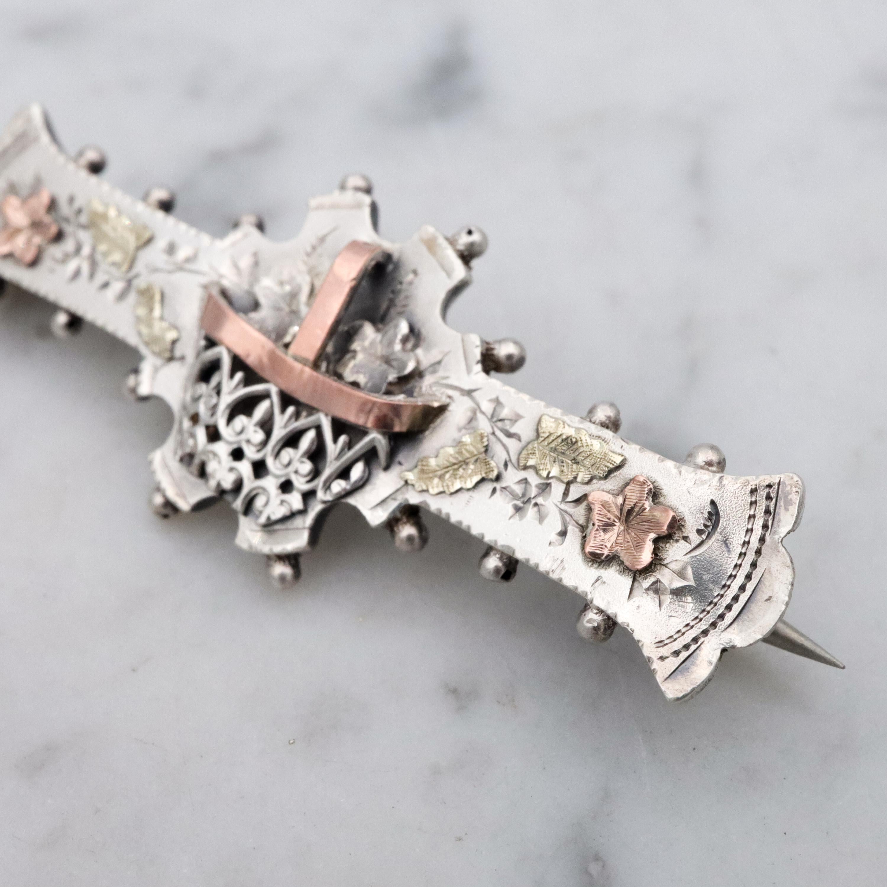 Victorian tri-color sterling Aesthetic Movement bar brooch with dimensional flower basket